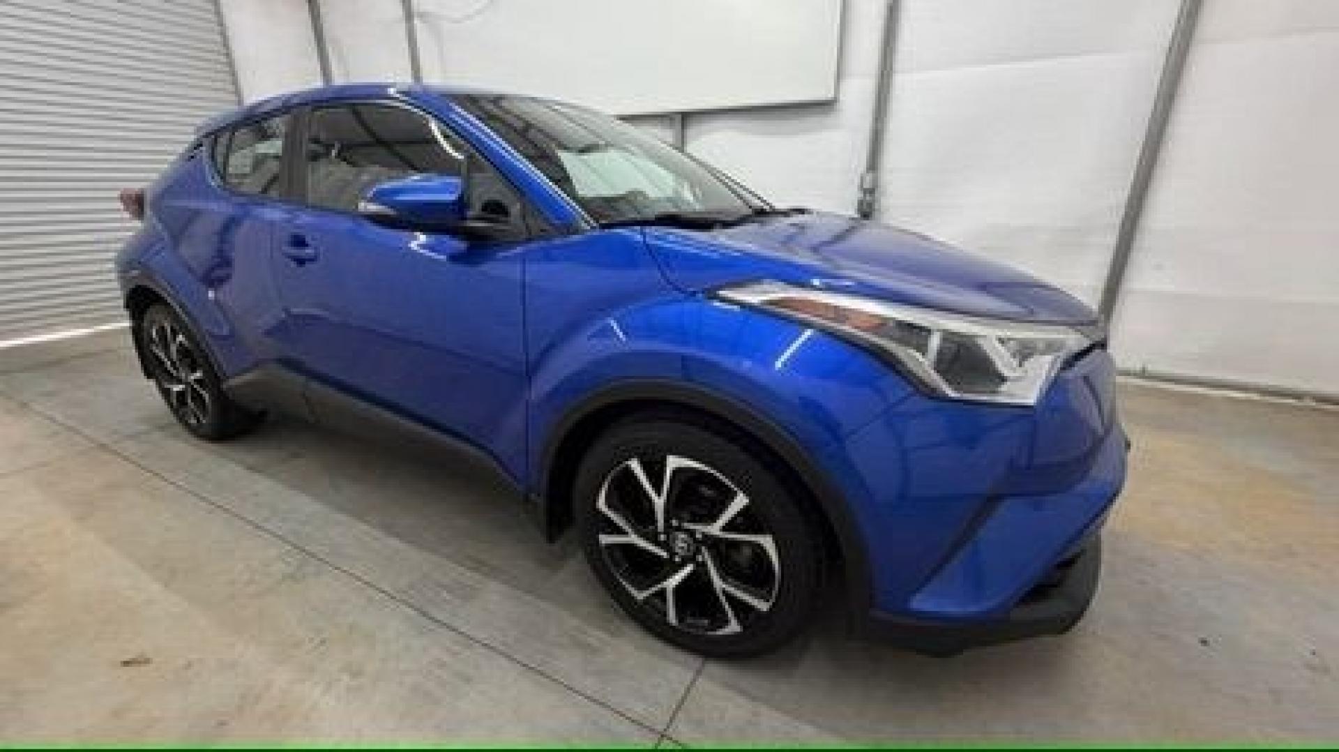 2018 Blue Toyota C-HR XLE Premium (NMTKHMBX7JR) with an 2L I-4 DOHC engine, located at 1806 Veterans Memorial Hwy SW, Austell, GA, 30168, (770) 944-9558, 33.817959, -84.606987- Photo#7