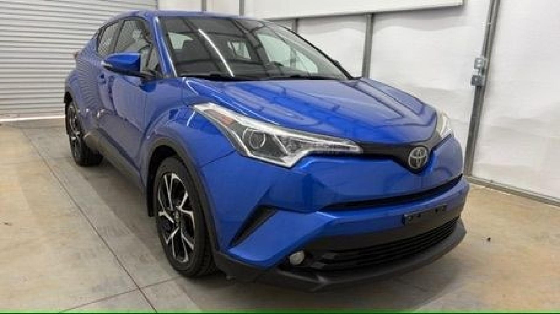 2018 Blue Toyota C-HR XLE Premium (NMTKHMBX7JR) with an 2L I-4 DOHC engine, located at 1806 Veterans Memorial Hwy SW, Austell, GA, 30168, (770) 944-9558, 33.817959, -84.606987- Photo#8