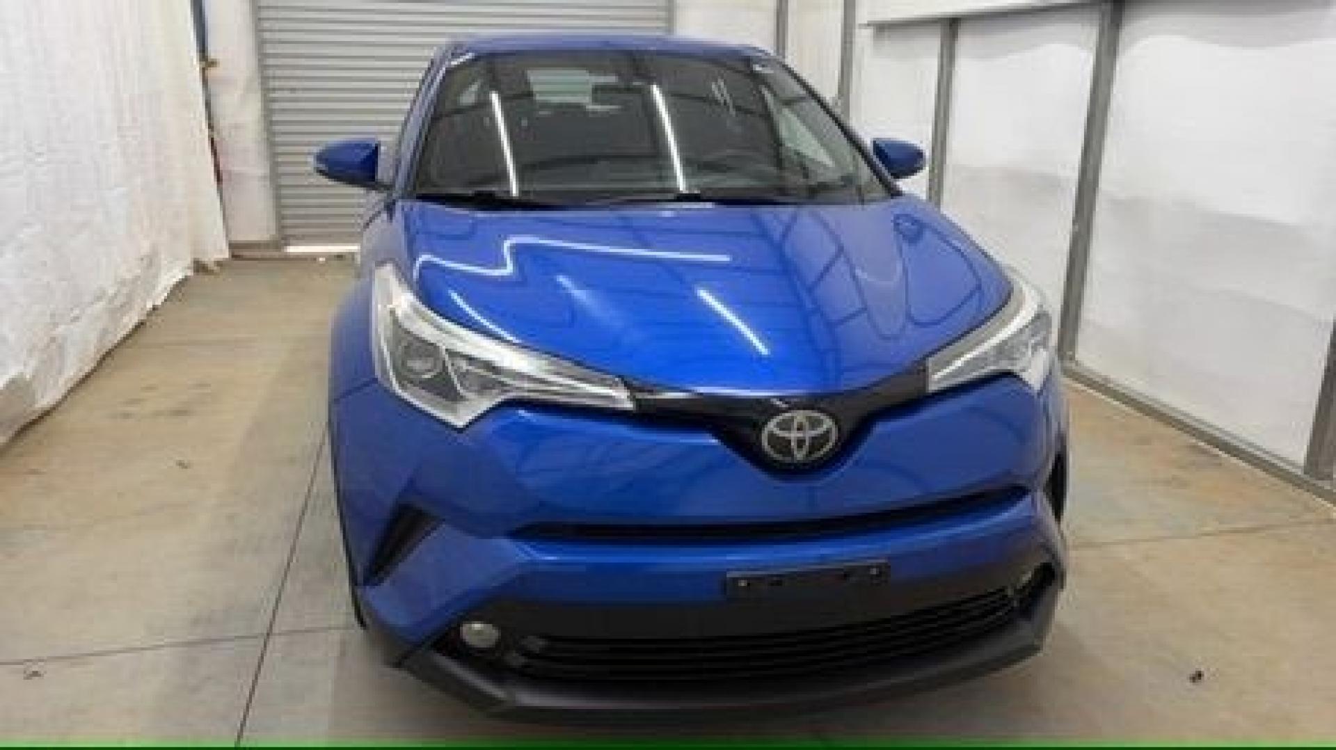 2018 Blue Toyota C-HR XLE Premium (NMTKHMBX7JR) with an 2L I-4 DOHC engine, located at 1806 Veterans Memorial Hwy SW, Austell, GA, 30168, (770) 944-9558, 33.817959, -84.606987- Photo#9