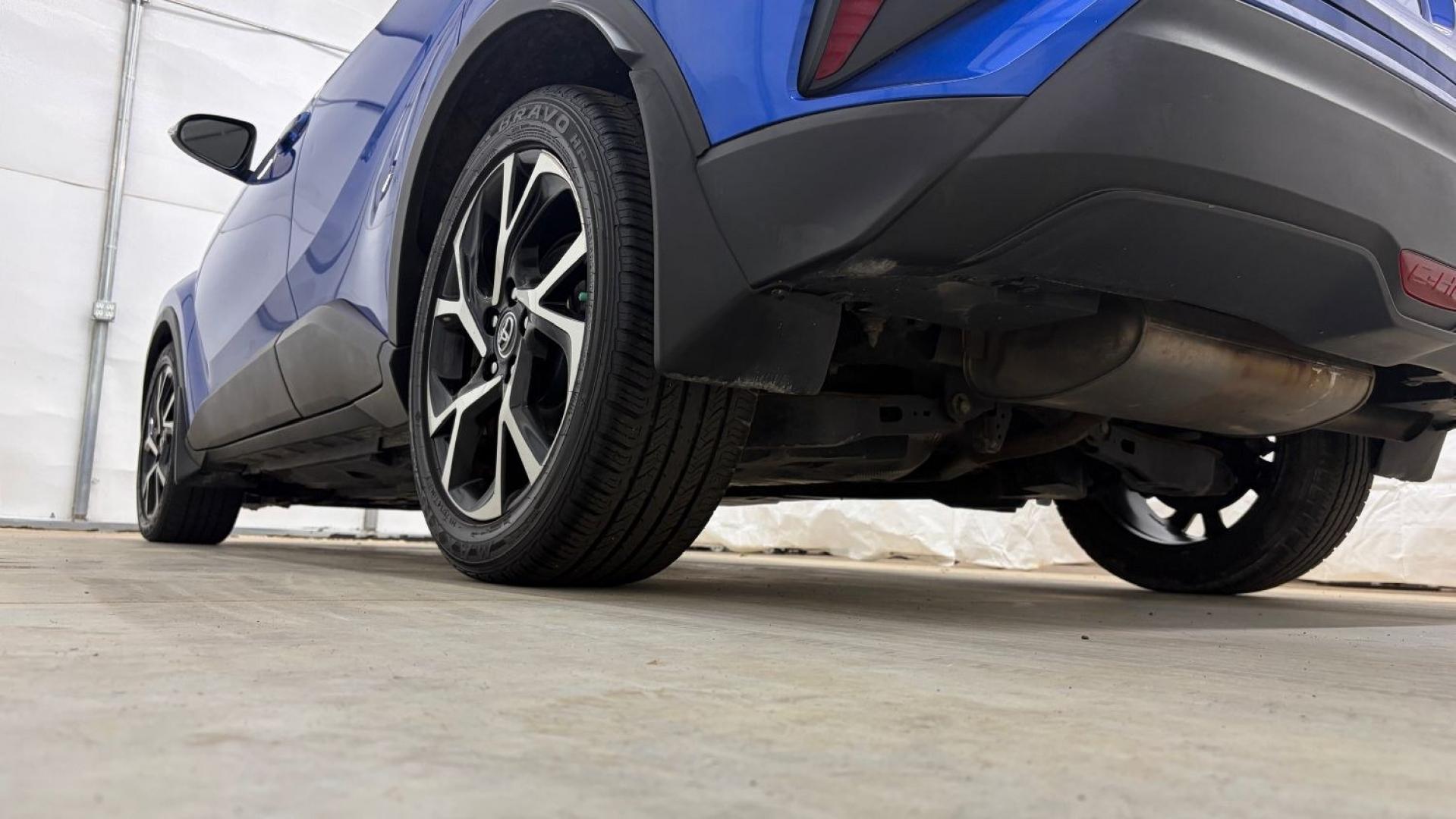 2018 Blue Toyota C-HR XLE Premium (NMTKHMBX7JR) with an 2L I-4 DOHC engine, located at 1806 Veterans Memorial Hwy SW, Austell, GA, 30168, (770) 944-9558, 33.817959, -84.606987- Photo#20
