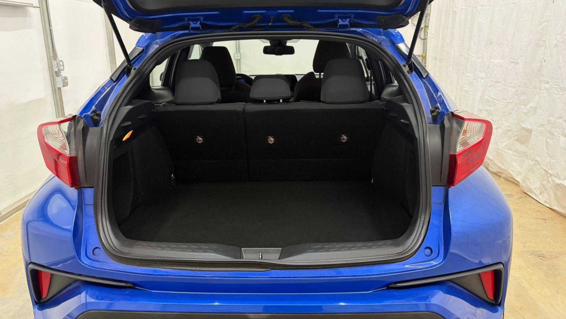 2018 Blue Toyota C-HR XLE Premium (NMTKHMBX7JR) with an 2L I-4 DOHC engine, located at 1806 Veterans Memorial Hwy SW, Austell, GA, 30168, (770) 944-9558, 33.817959, -84.606987- Photo#22