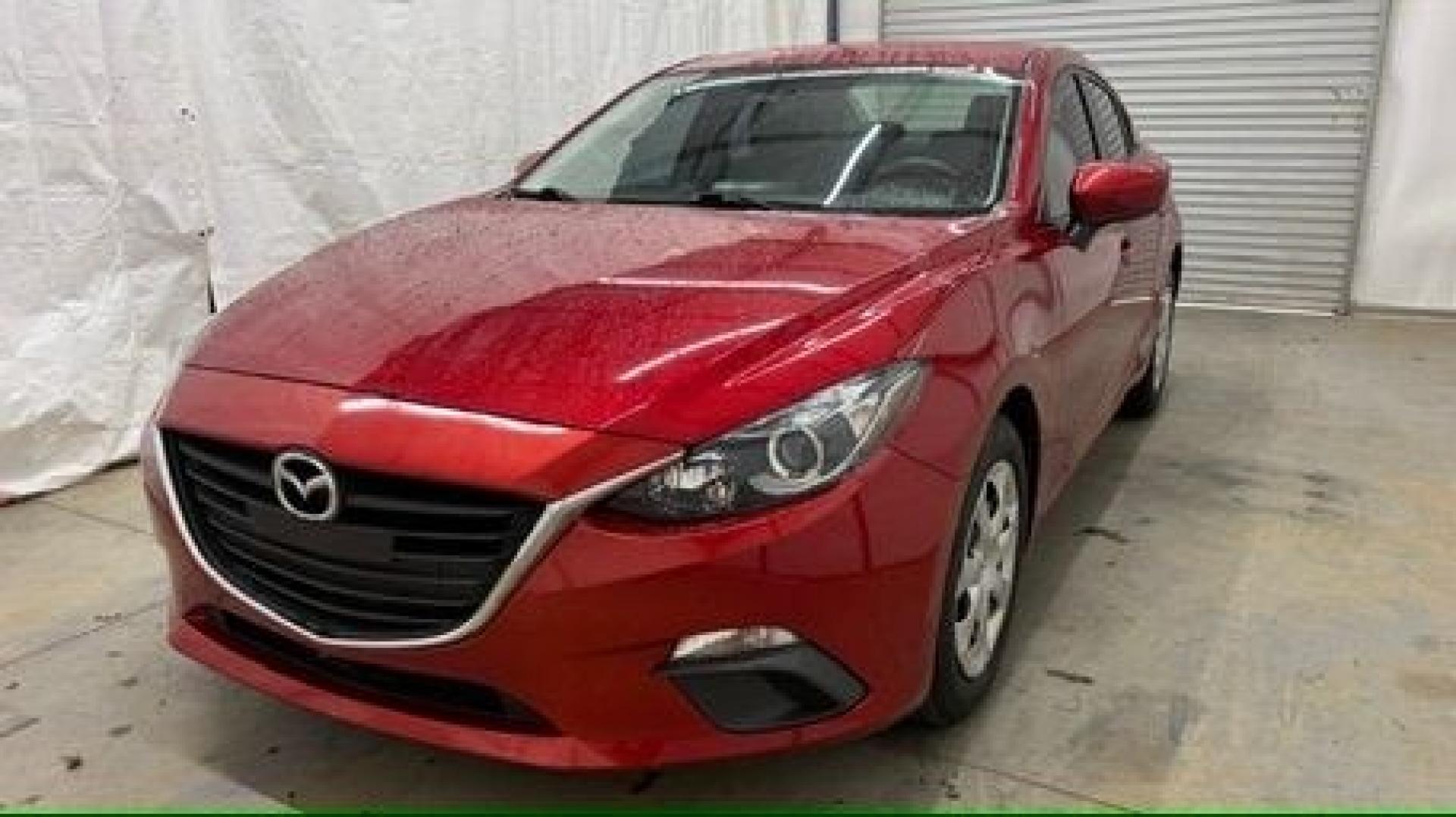 2016 Red Mazda Mazda3 i Sport (3MZBM1T71GM) with an SKYACTIV-G 2L I-4 gasoline direct injection engine, located at 1806 Veterans Memorial Hwy SW, Austell, GA, 30168, (770) 944-9558, 33.817959, -84.606987- Photo#0