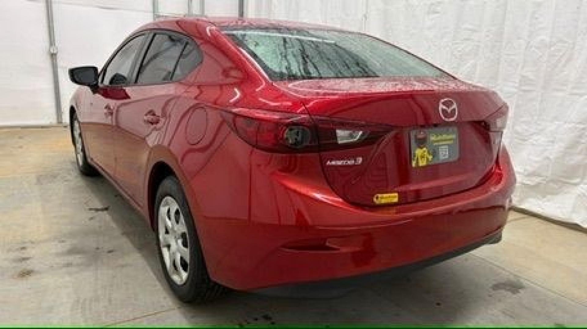 2016 Red Mazda Mazda3 i Sport (3MZBM1T71GM) with an SKYACTIV-G 2L I-4 gasoline direct injection engine, located at 1806 Veterans Memorial Hwy SW, Austell, GA, 30168, (770) 944-9558, 33.817959, -84.606987- Photo#3