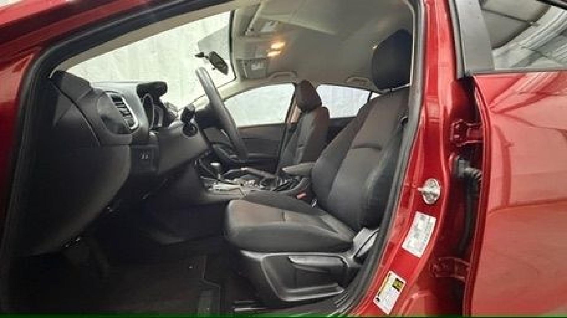 2016 Red Mazda Mazda3 i Sport (3MZBM1T71GM) with an SKYACTIV-G 2L I-4 gasoline direct injection engine, located at 1806 Veterans Memorial Hwy SW, Austell, GA, 30168, (770) 944-9558, 33.817959, -84.606987- Photo#12