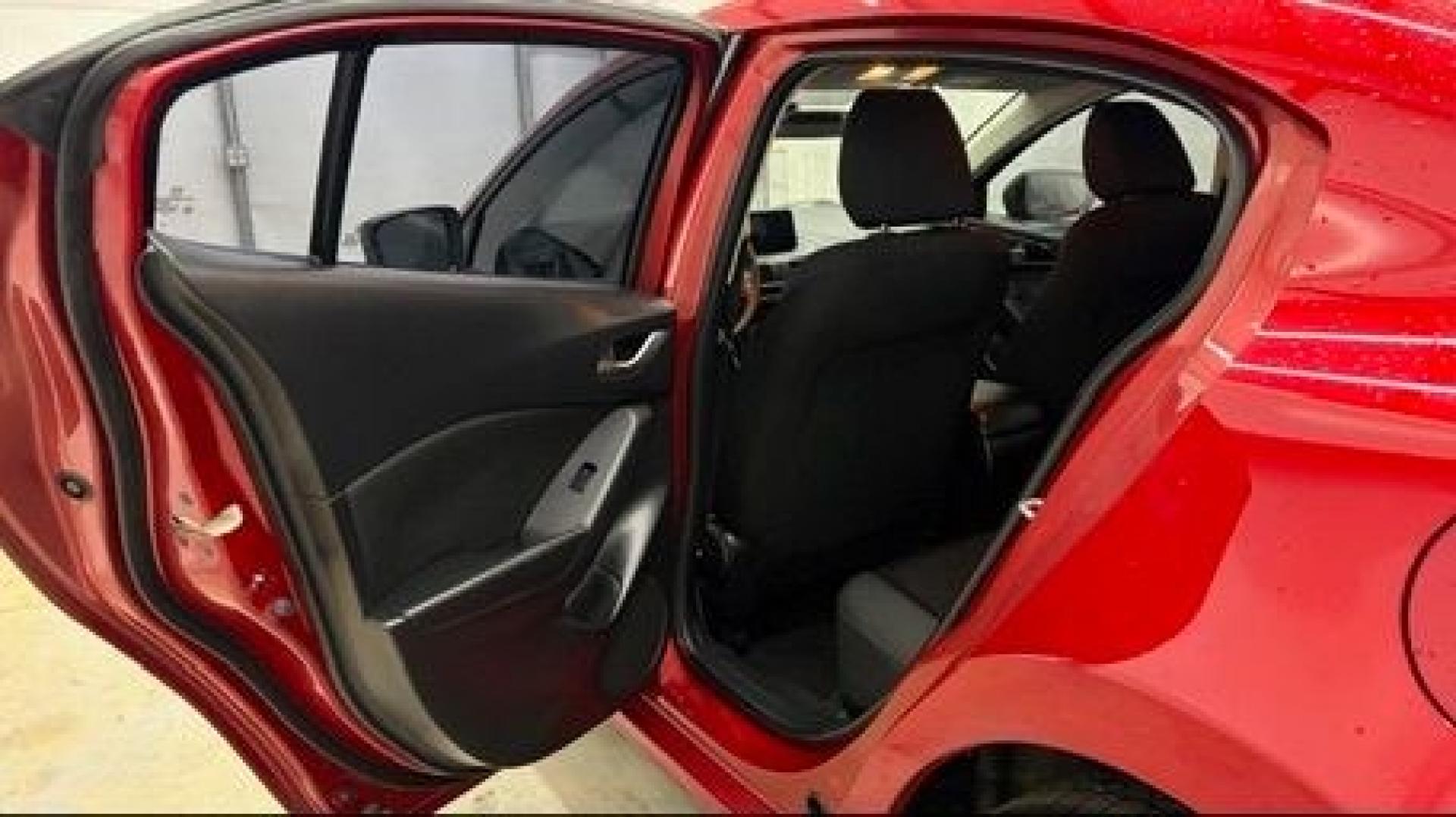 2016 Red Mazda Mazda3 i Sport (3MZBM1T71GM) with an SKYACTIV-G 2L I-4 gasoline direct injection engine, located at 1806 Veterans Memorial Hwy SW, Austell, GA, 30168, (770) 944-9558, 33.817959, -84.606987- Photo#13