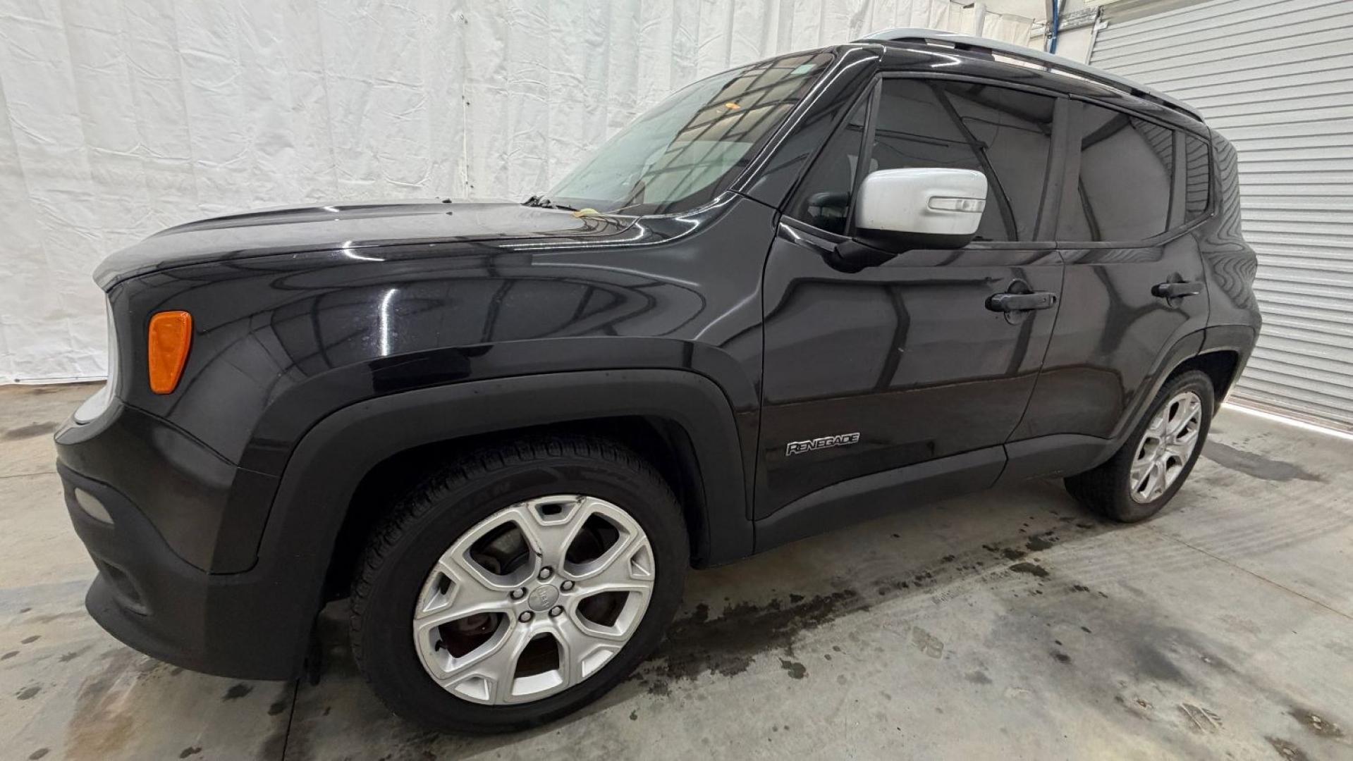 2016 Black Jeep Renegade Limited (ZACCJADT7GP) with an Tigershark MultiAir 2.4L I-4 variable valve contro engine, located at 1806 Veterans Memorial Hwy SW, Austell, GA, 30168, (770) 944-9558, 33.817959, -84.606987- Photo#1