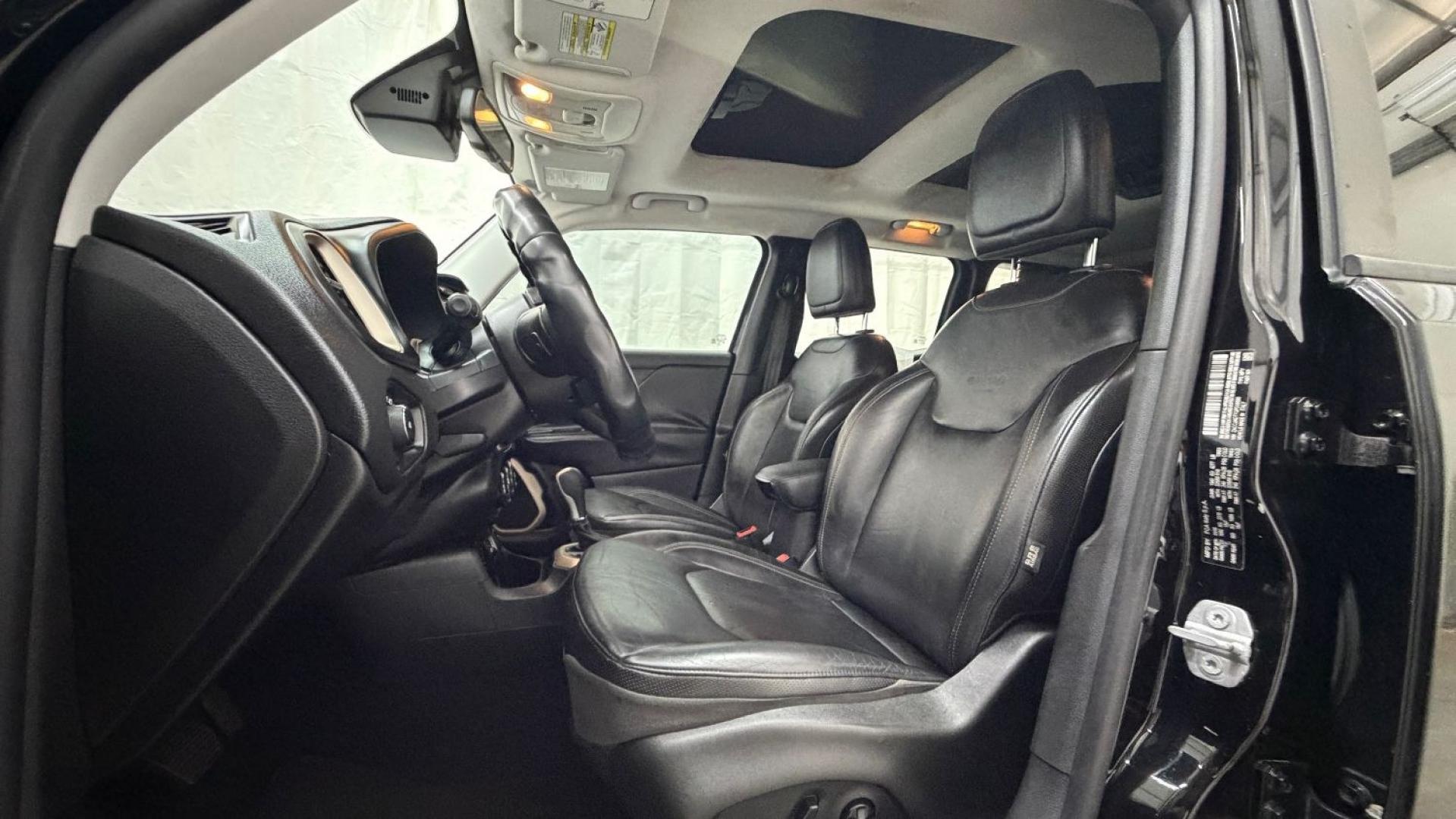 2016 Black Jeep Renegade Limited (ZACCJADT7GP) with an Tigershark MultiAir 2.4L I-4 variable valve contro engine, located at 1806 Veterans Memorial Hwy SW, Austell, GA, 30168, (770) 944-9558, 33.817959, -84.606987- Photo#13