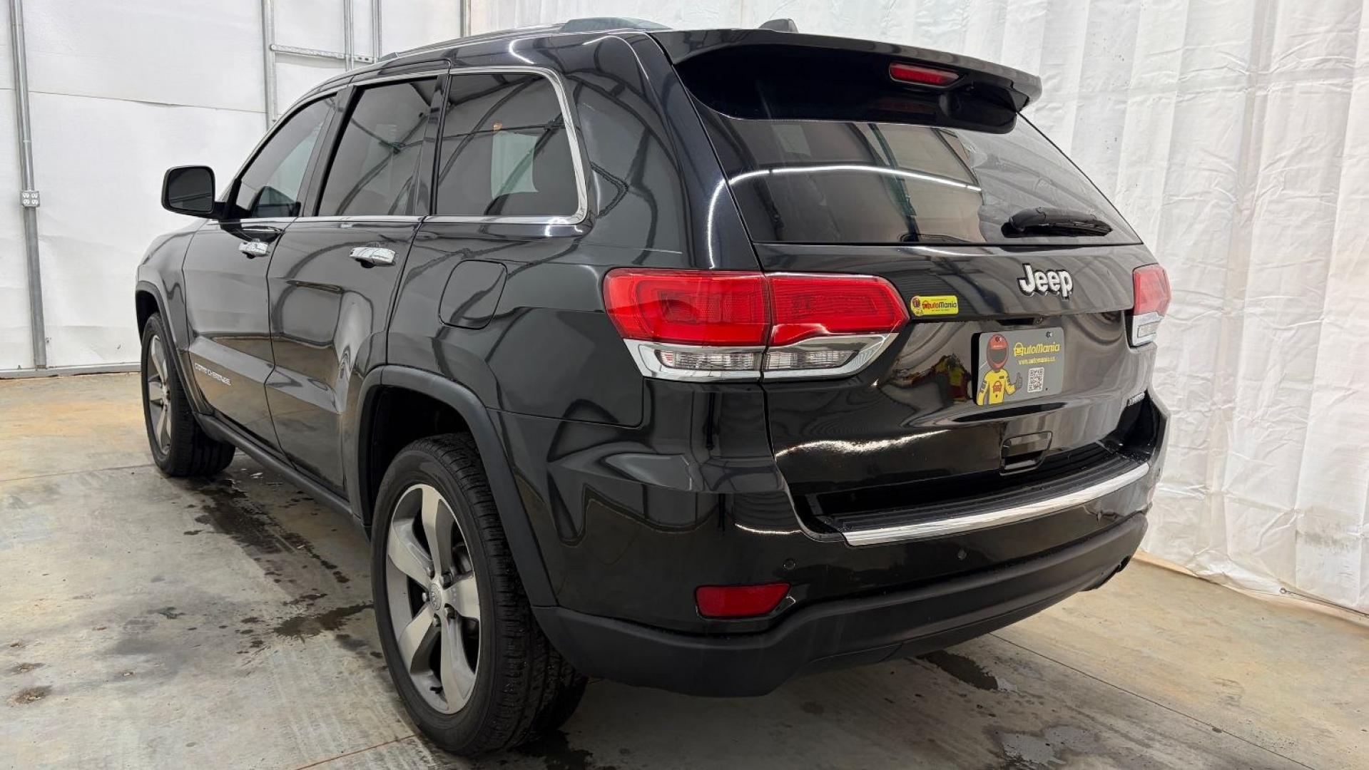 2015 Black Jeep Grand Cherokee Limited (1C4RJEBGXFC) , located at 1806 Veterans Memorial Hwy SW, Austell, GA, 30168, (770) 944-9558, 33.817959, -84.606987- Photo#3