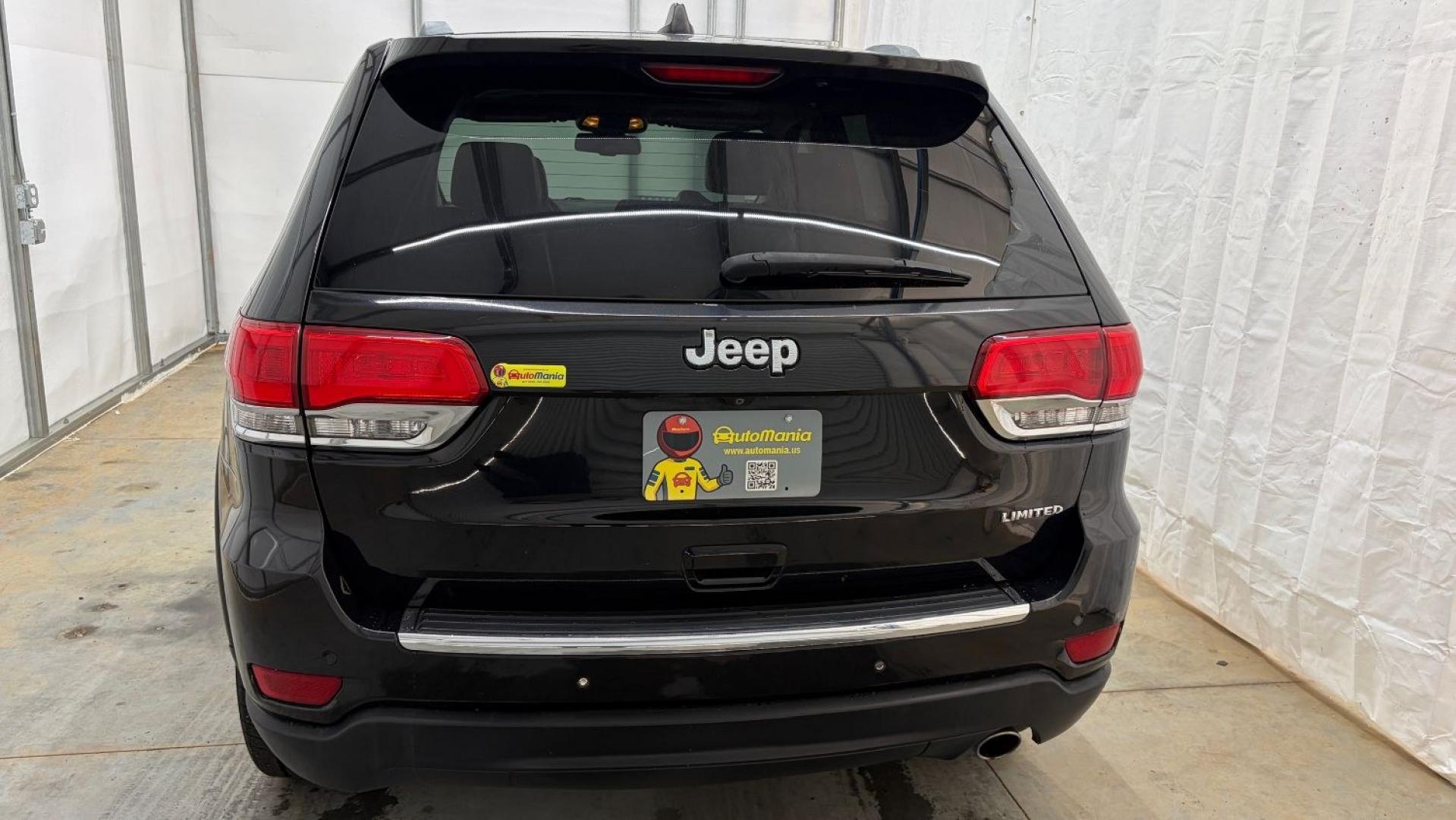 2015 Black Jeep Grand Cherokee Limited (1C4RJEBGXFC) , located at 1806 Veterans Memorial Hwy SW, Austell, GA, 30168, (770) 944-9558, 33.817959, -84.606987- Photo#4