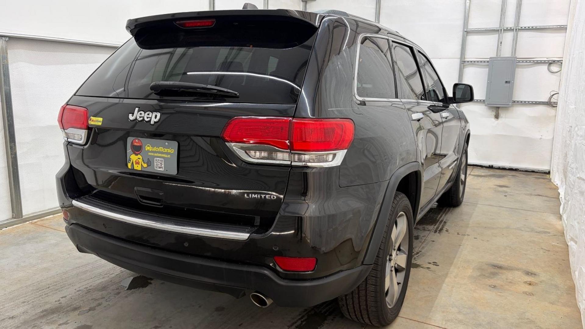 2015 Black Jeep Grand Cherokee Limited (1C4RJEBGXFC) , located at 1806 Veterans Memorial Hwy SW, Austell, GA, 30168, (770) 944-9558, 33.817959, -84.606987- Photo#6
