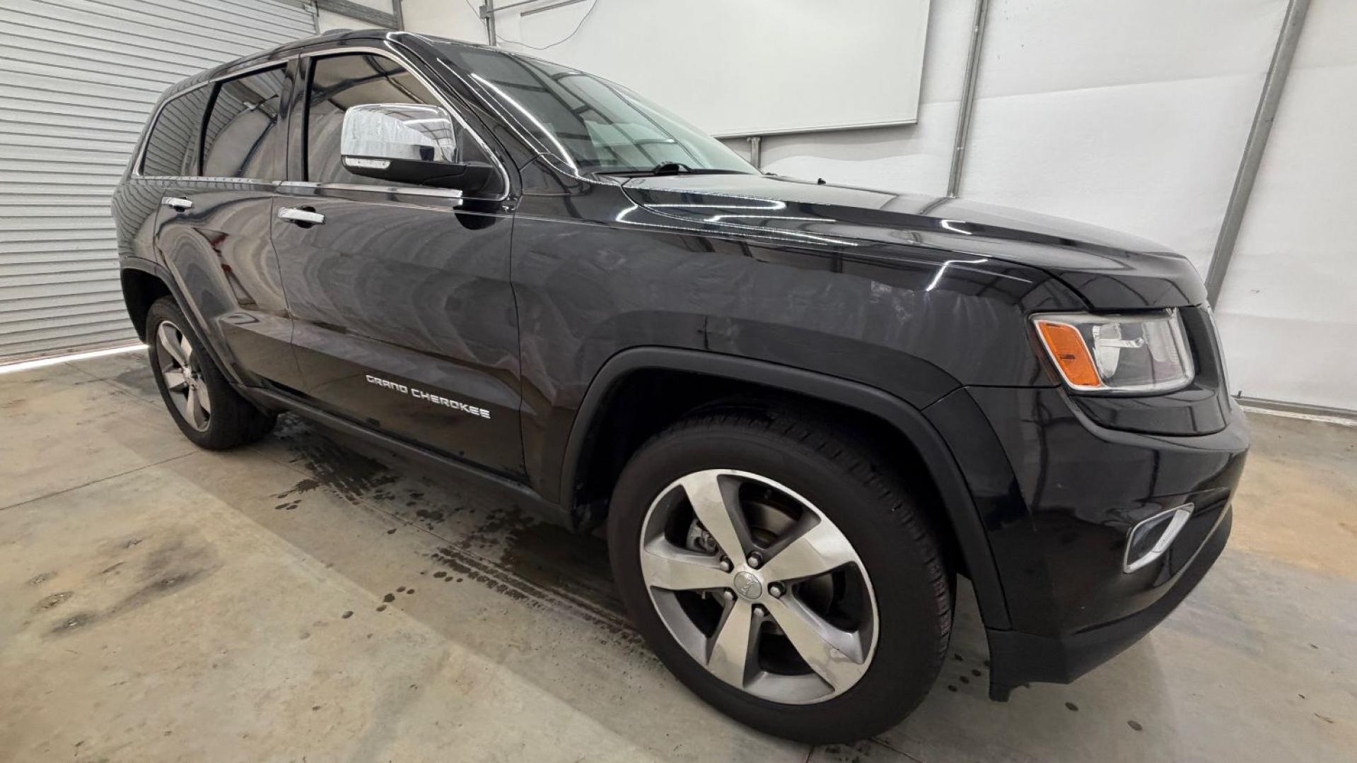 2015 Black Jeep Grand Cherokee Limited (1C4RJEBGXFC) , located at 1806 Veterans Memorial Hwy SW, Austell, GA, 30168, (770) 944-9558, 33.817959, -84.606987- Photo#8