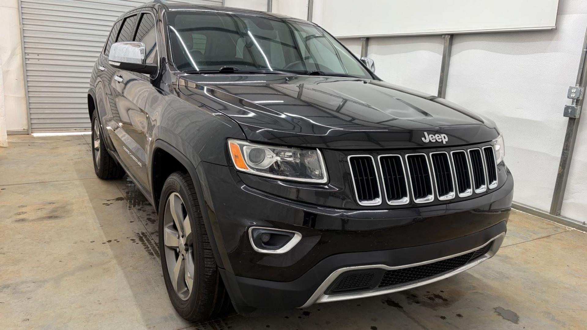 2015 Black Jeep Grand Cherokee Limited (1C4RJEBGXFC) , located at 1806 Veterans Memorial Hwy SW, Austell, GA, 30168, (770) 944-9558, 33.817959, -84.606987- Photo#9