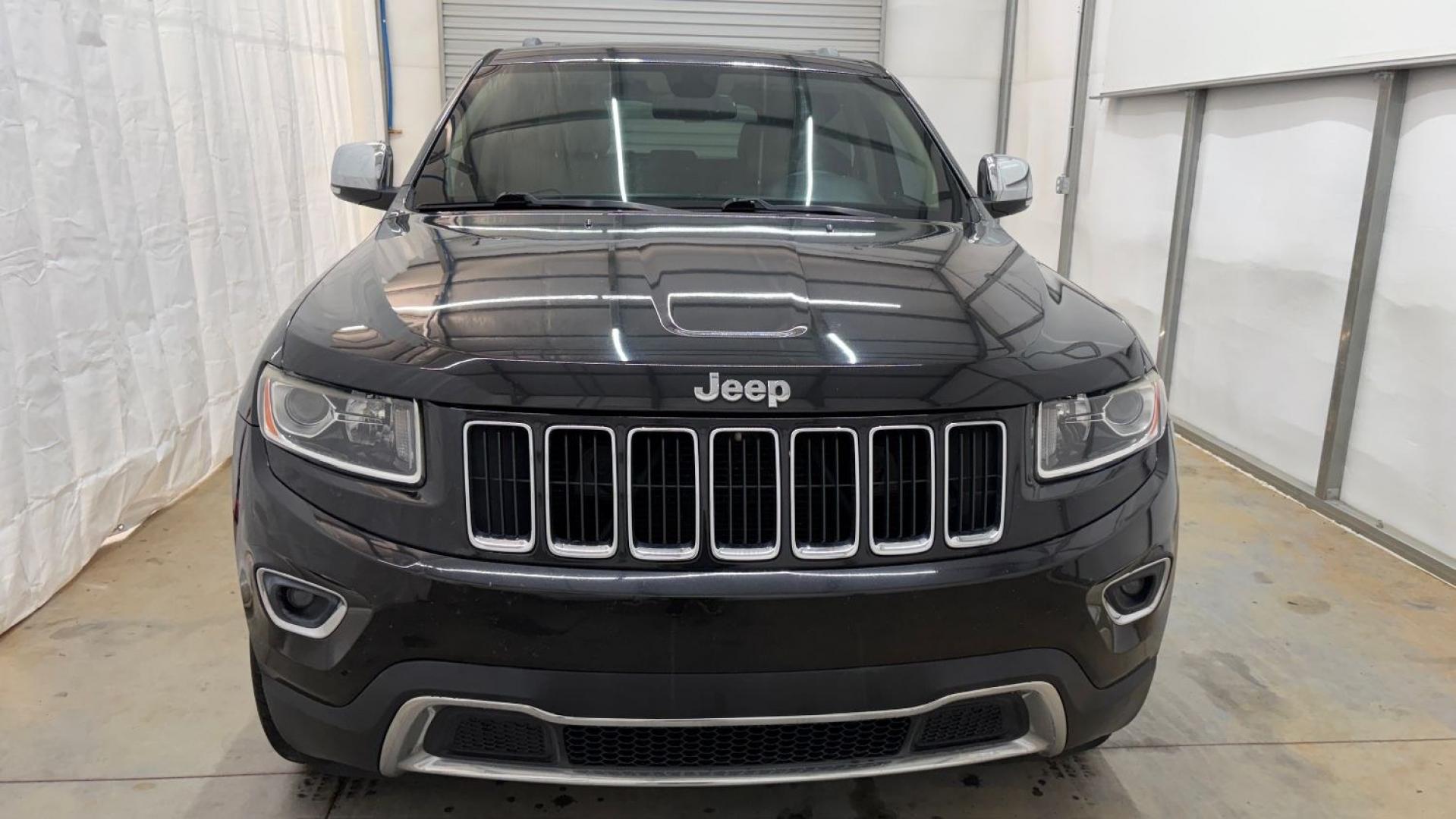 2015 Black Jeep Grand Cherokee Limited (1C4RJEBGXFC) , located at 1806 Veterans Memorial Hwy SW, Austell, GA, 30168, (770) 944-9558, 33.817959, -84.606987- Photo#10