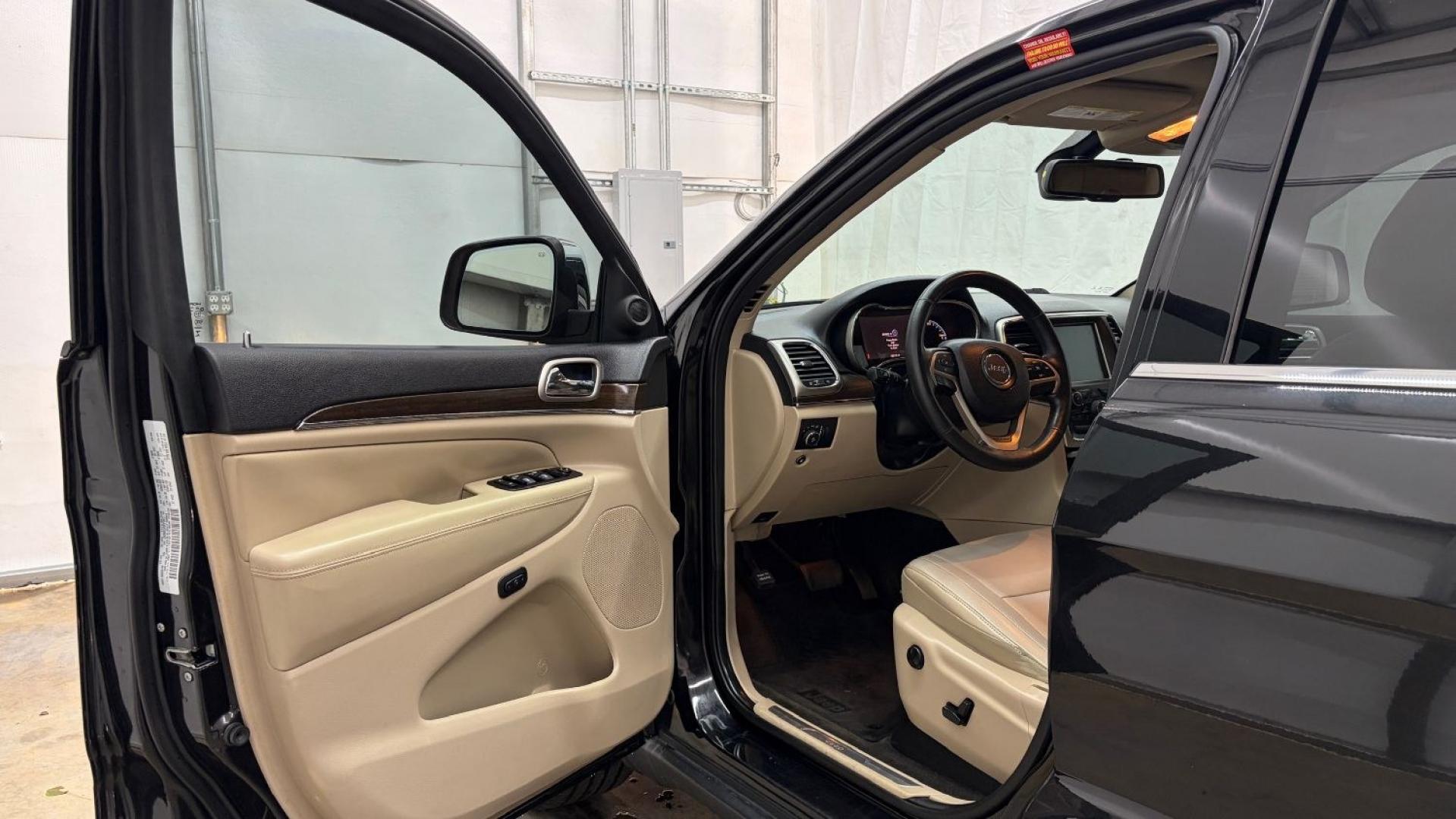 2015 Black Jeep Grand Cherokee Limited (1C4RJEBGXFC) , located at 1806 Veterans Memorial Hwy SW, Austell, GA, 30168, (770) 944-9558, 33.817959, -84.606987- Photo#11