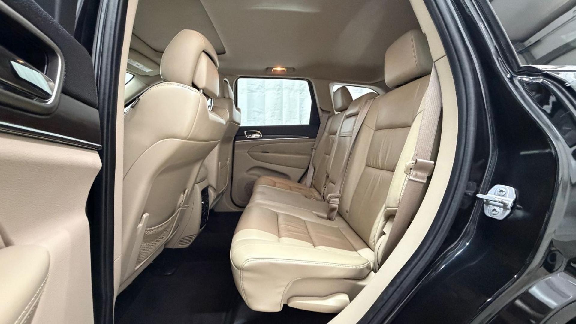 2015 Black Jeep Grand Cherokee Limited (1C4RJEBGXFC) , located at 1806 Veterans Memorial Hwy SW, Austell, GA, 30168, (770) 944-9558, 33.817959, -84.606987- Photo#15