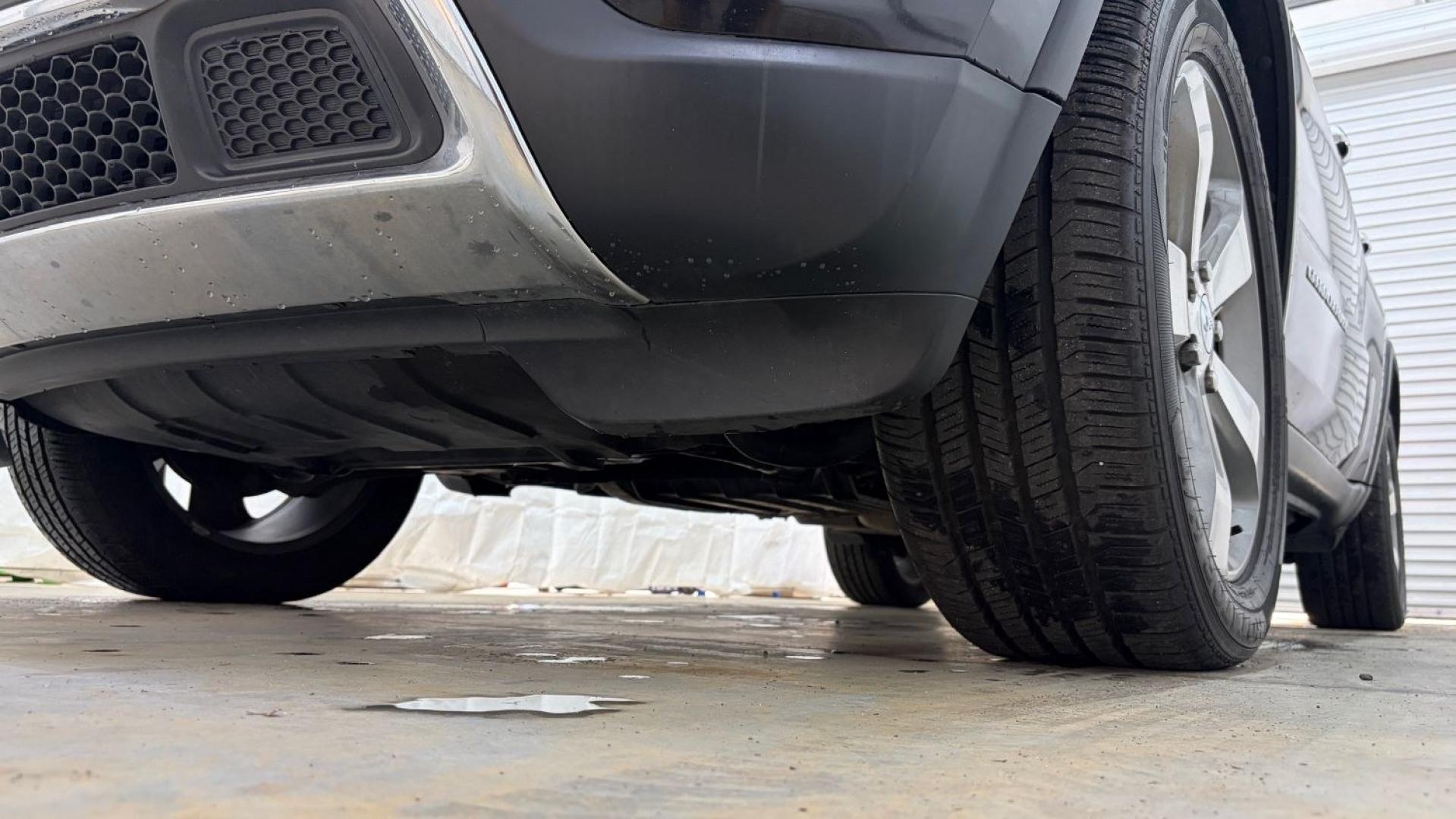 2015 Black Jeep Grand Cherokee Limited (1C4RJEBGXFC) , located at 1806 Veterans Memorial Hwy SW, Austell, GA, 30168, (770) 944-9558, 33.817959, -84.606987- Photo#20