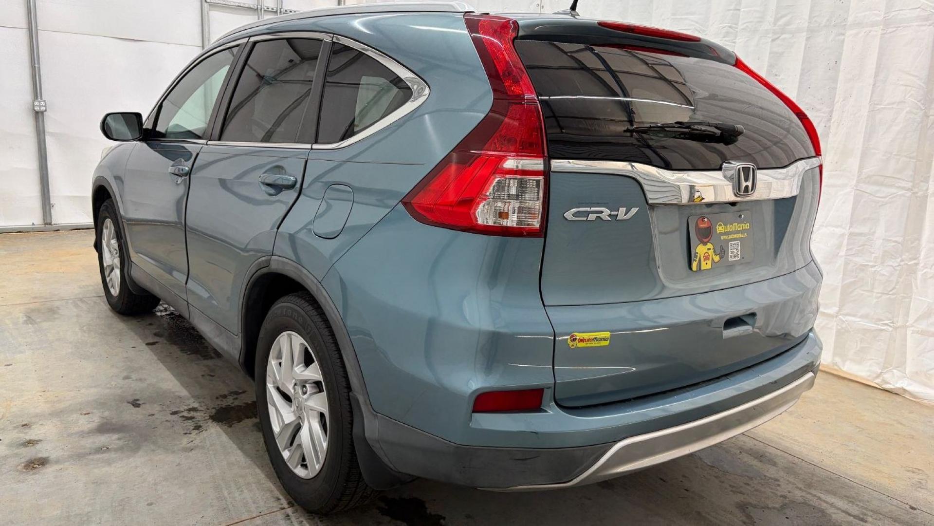 2015 Teal Honda CR-V EX-L (2HKRM3H79FH) with an 2.4L I-4 gasoline direct injection engine, located at 1806 Veterans Memorial Hwy SW, Austell, GA, 30168, (770) 944-9558, 33.817959, -84.606987- Photo#3