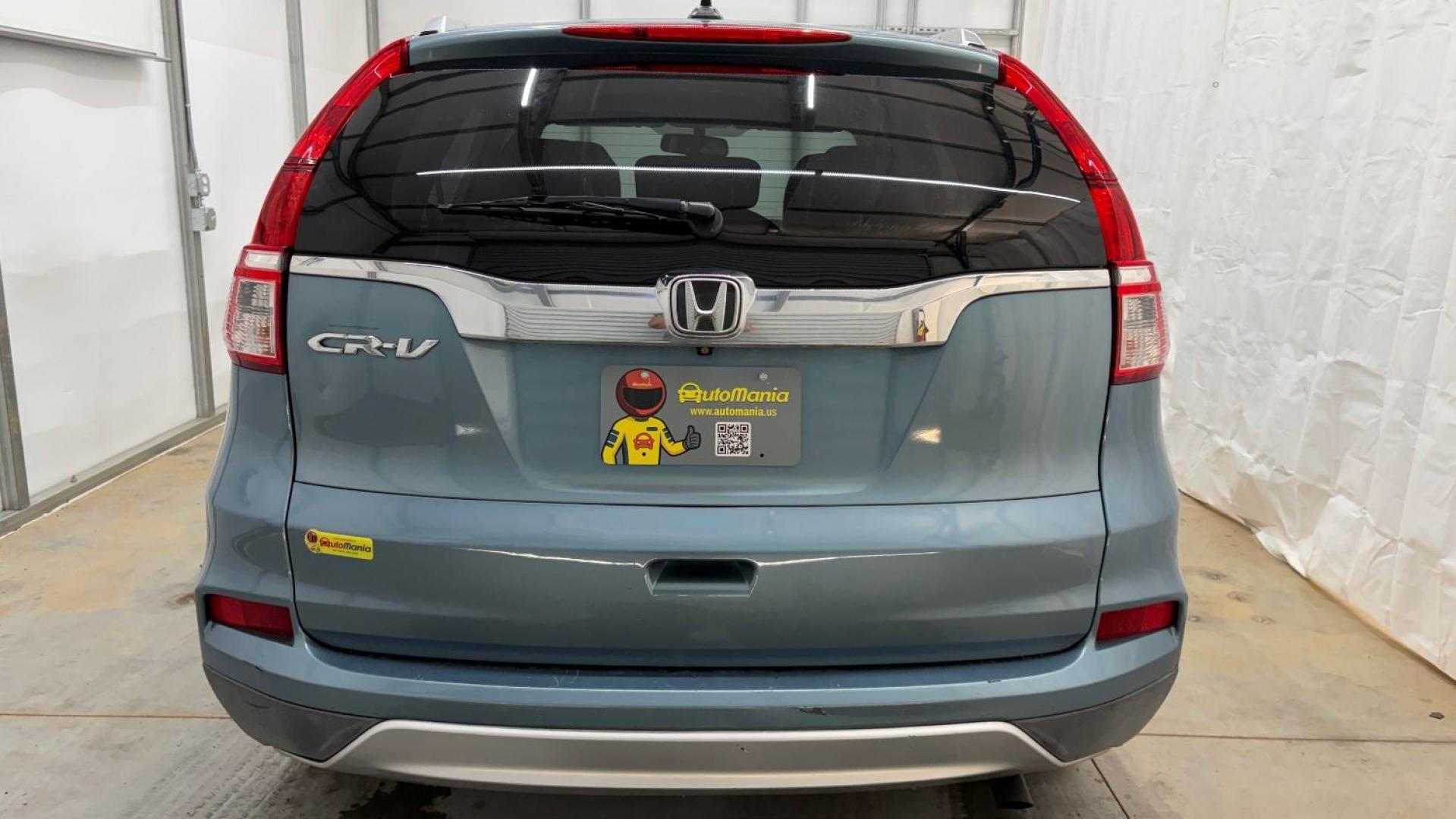 2015 Teal Honda CR-V EX-L (2HKRM3H79FH) with an 2.4L I-4 gasoline direct injection engine, located at 1806 Veterans Memorial Hwy SW, Austell, GA, 30168, (770) 944-9558, 33.817959, -84.606987- Photo#4