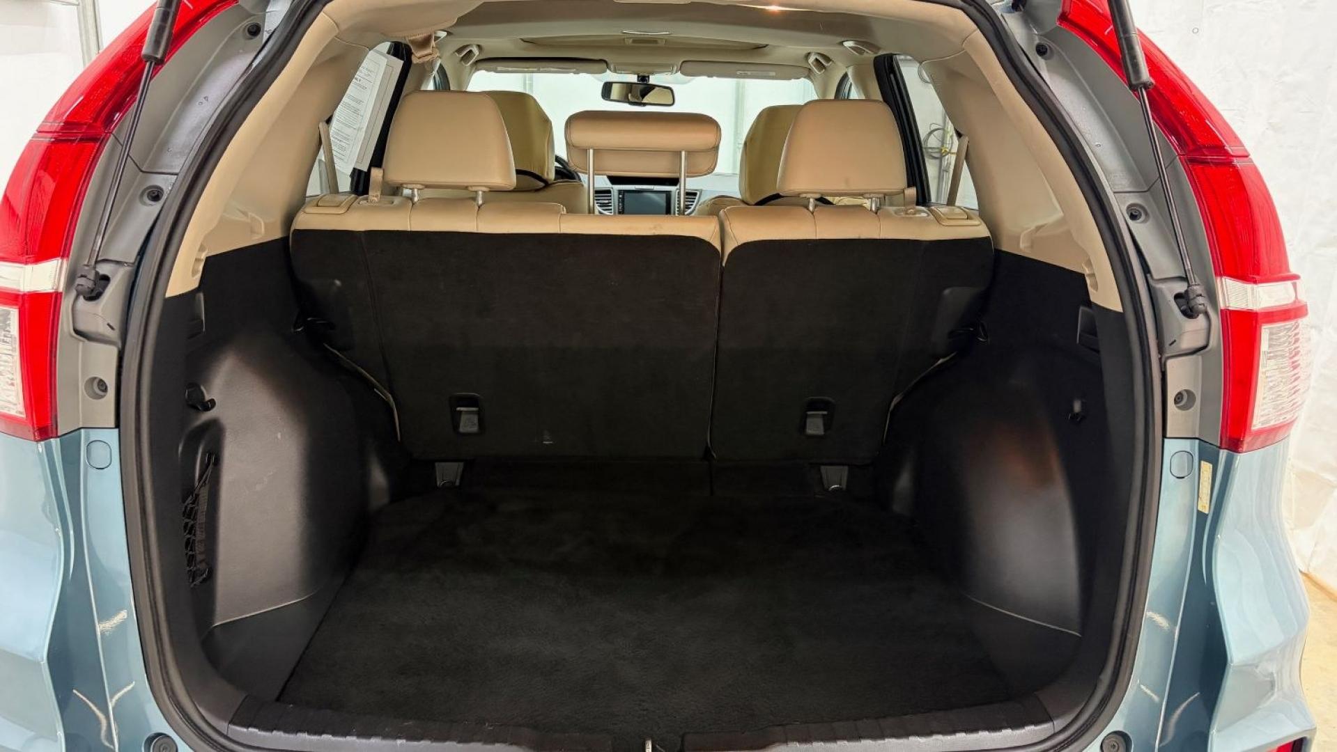2015 Teal Honda CR-V EX-L (2HKRM3H79FH) with an 2.4L I-4 gasoline direct injection engine, located at 1806 Veterans Memorial Hwy SW, Austell, GA, 30168, (770) 944-9558, 33.817959, -84.606987- Photo#5