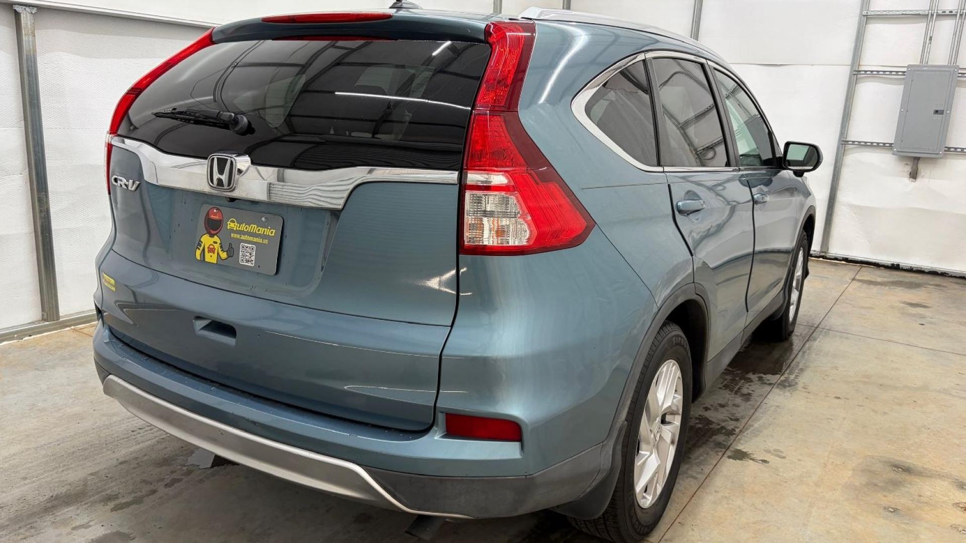 2015 Teal Honda CR-V EX-L (2HKRM3H79FH) with an 2.4L I-4 gasoline direct injection engine, located at 1806 Veterans Memorial Hwy SW, Austell, GA, 30168, (770) 944-9558, 33.817959, -84.606987- Photo#6