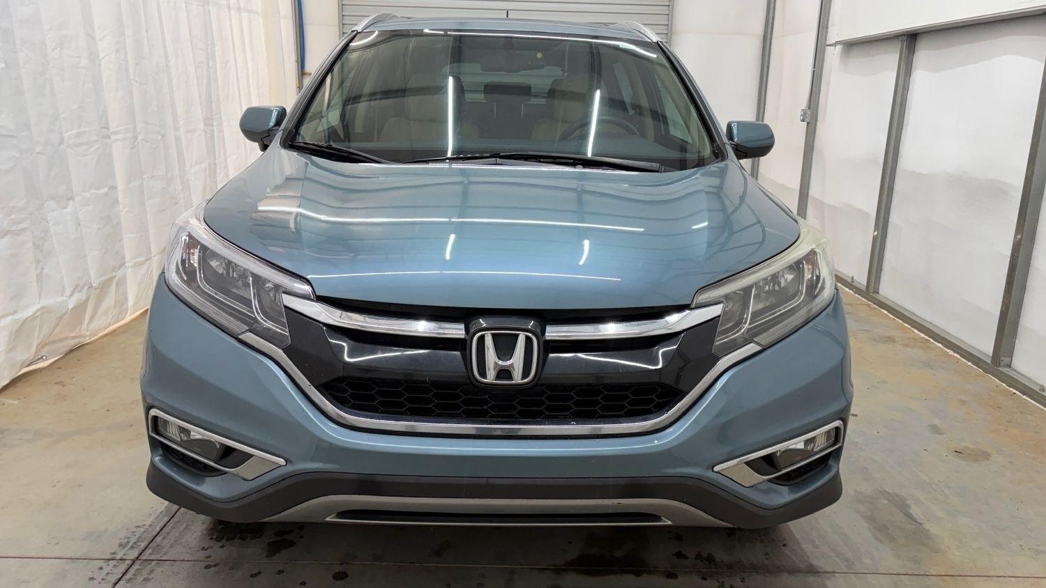 2015 Teal Honda CR-V EX-L (2HKRM3H79FH) with an 2.4L I-4 gasoline direct injection engine, located at 1806 Veterans Memorial Hwy SW, Austell, GA, 30168, (770) 944-9558, 33.817959, -84.606987- Photo#10
