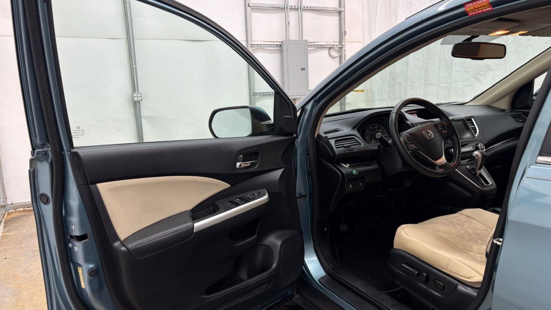 2015 Teal Honda CR-V EX-L (2HKRM3H79FH) with an 2.4L I-4 gasoline direct injection engine, located at 1806 Veterans Memorial Hwy SW, Austell, GA, 30168, (770) 944-9558, 33.817959, -84.606987- Photo#11
