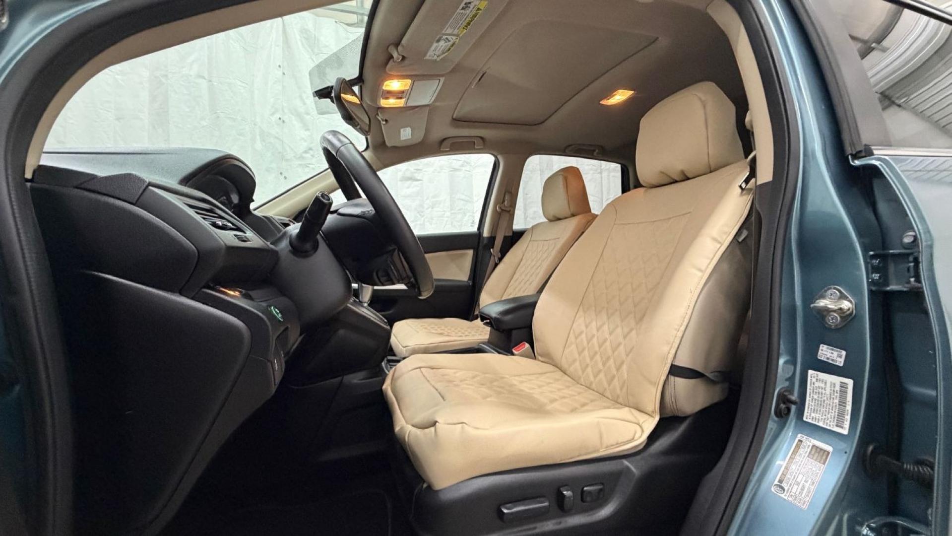 2015 Teal Honda CR-V EX-L (2HKRM3H79FH) with an 2.4L I-4 gasoline direct injection engine, located at 1806 Veterans Memorial Hwy SW, Austell, GA, 30168, (770) 944-9558, 33.817959, -84.606987- Photo#13