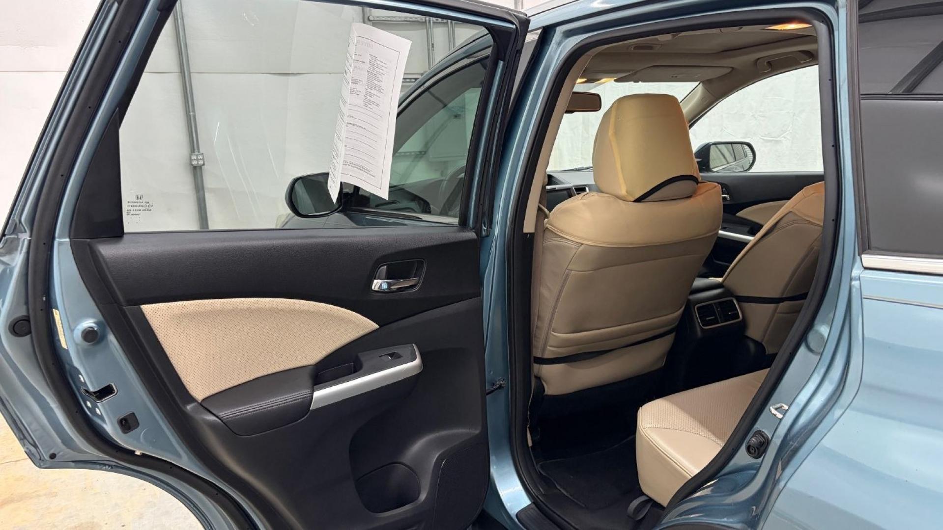 2015 Teal Honda CR-V EX-L (2HKRM3H79FH) with an 2.4L I-4 gasoline direct injection engine, located at 1806 Veterans Memorial Hwy SW, Austell, GA, 30168, (770) 944-9558, 33.817959, -84.606987- Photo#14