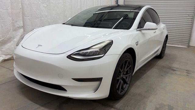 2019 White Tesla Model 3 Standard Range (5YJ3E1EA0KF) , located at 1806 Veterans Memorial Hwy SW, Austell, GA, 30168, (770) 944-9558, 33.817959, -84.606987 - Photo#0