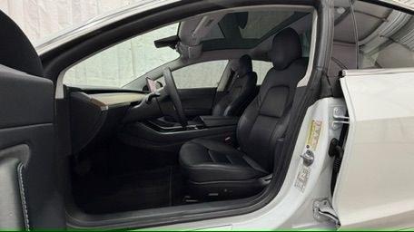 2019 White Tesla Model 3 Standard Range (5YJ3E1EA0KF) , located at 1806 Veterans Memorial Hwy SW, Austell, GA, 30168, (770) 944-9558, 33.817959, -84.606987 - Photo#12