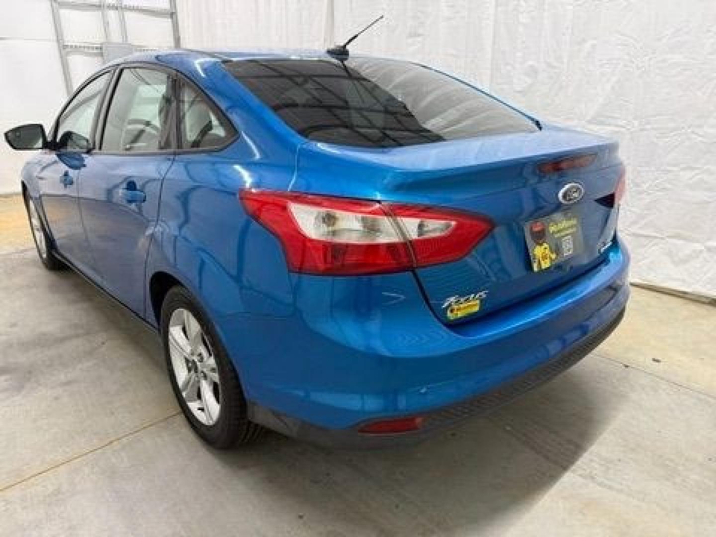 2014 Blue Ford Focus SE (1FADP3F20EL) with an 2L I-4 gasoline direct injection engine, located at 1806 Veterans Memorial Hwy SW, Austell, GA, 30168, (770) 944-9558, 33.817959, -84.606987- Photo#3