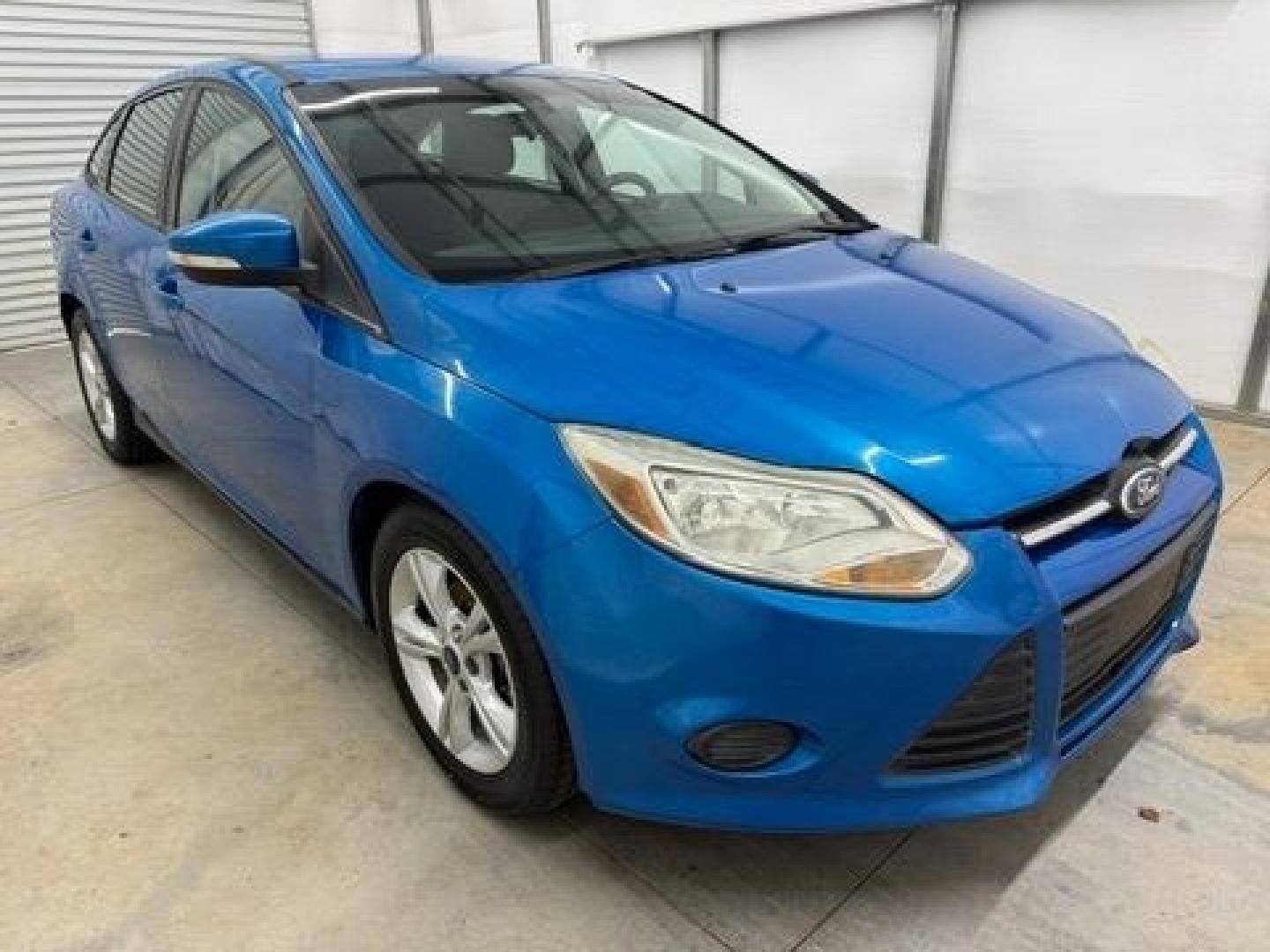 2014 Blue Ford Focus SE (1FADP3F20EL) with an 2L I-4 gasoline direct injection engine, located at 1806 Veterans Memorial Hwy SW, Austell, GA, 30168, (770) 944-9558, 33.817959, -84.606987- Photo#8