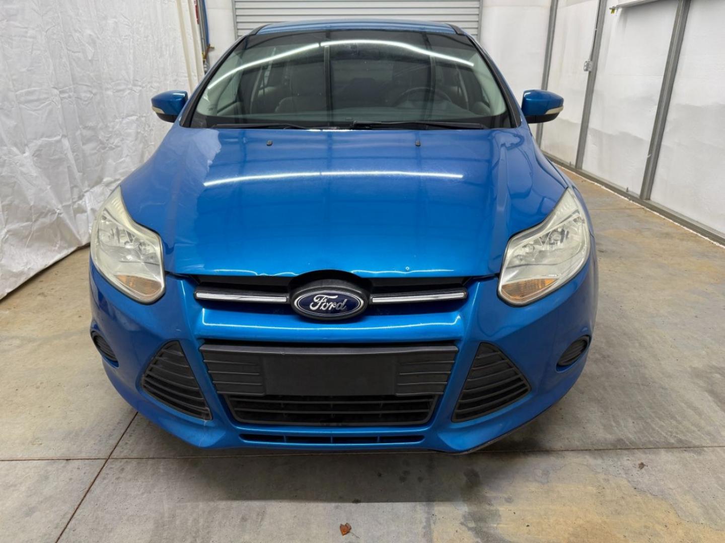 2014 Blue Ford Focus SE (1FADP3F20EL) with an 2L I-4 gasoline direct injection engine, located at 1806 Veterans Memorial Hwy SW, Austell, GA, 30168, (770) 944-9558, 33.817959, -84.606987- Photo#9