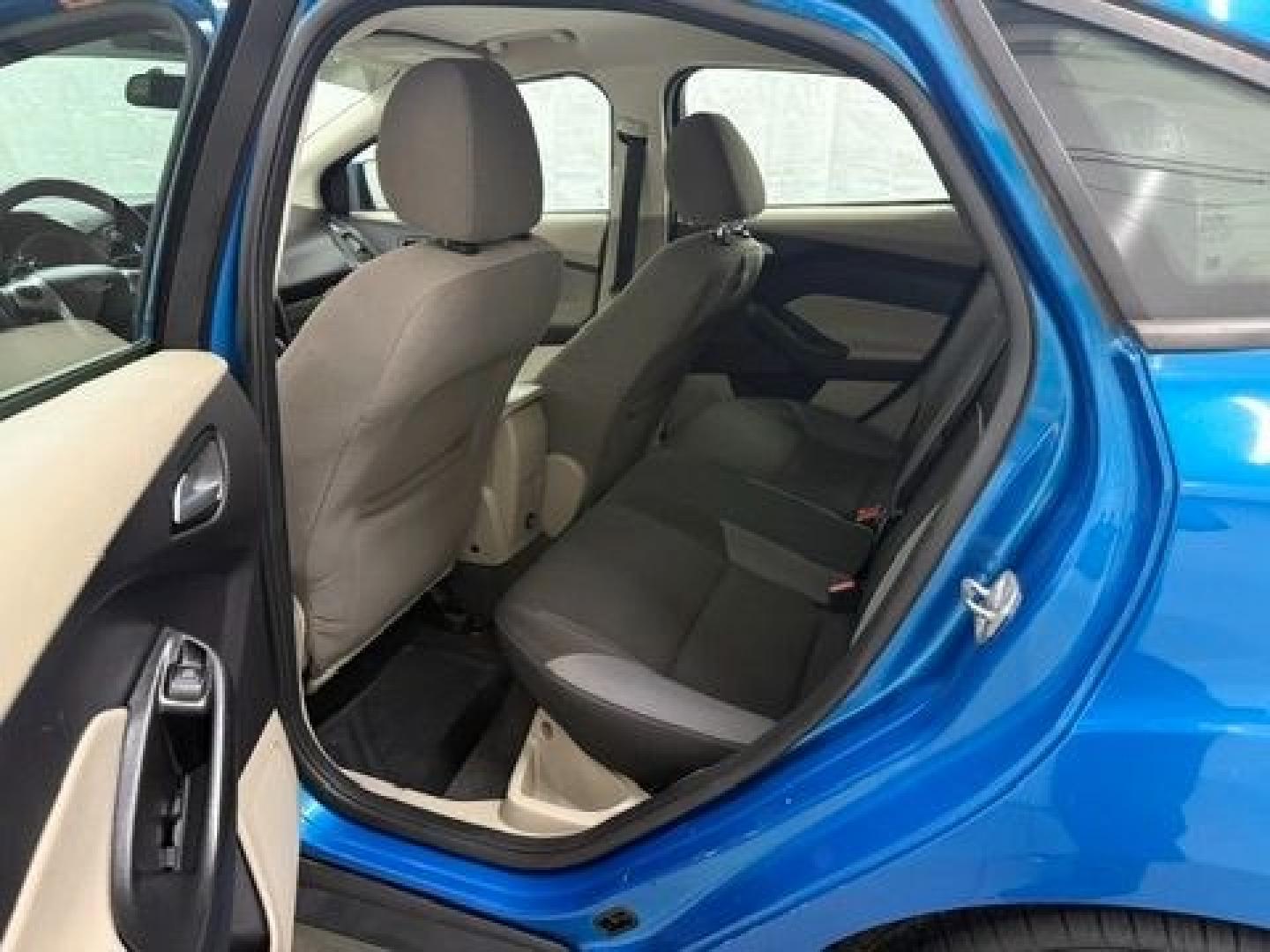 2014 Blue Ford Focus SE (1FADP3F20EL) with an 2L I-4 gasoline direct injection engine, located at 1806 Veterans Memorial Hwy SW, Austell, GA, 30168, (770) 944-9558, 33.817959, -84.606987- Photo#12