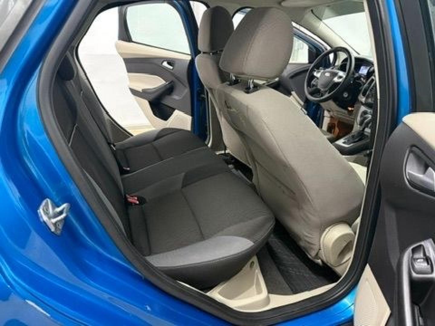 2014 Blue Ford Focus SE (1FADP3F20EL) with an 2L I-4 gasoline direct injection engine, located at 1806 Veterans Memorial Hwy SW, Austell, GA, 30168, (770) 944-9558, 33.817959, -84.606987- Photo#13