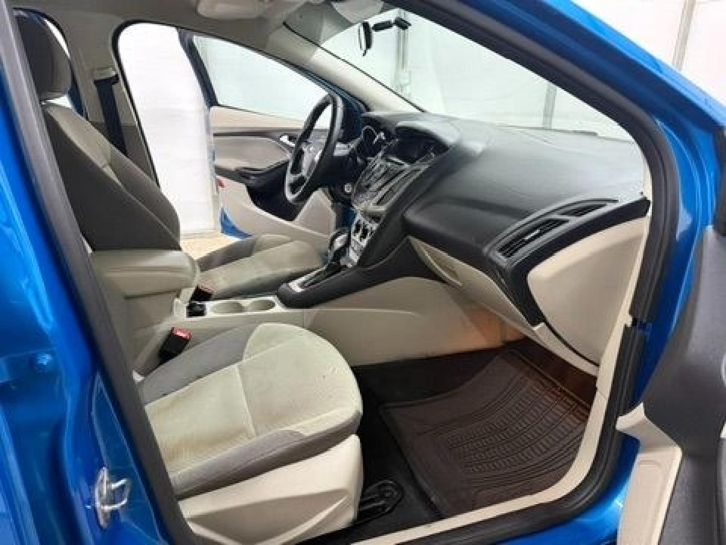 2014 Blue Ford Focus SE (1FADP3F20EL) with an 2L I-4 gasoline direct injection engine, located at 1806 Veterans Memorial Hwy SW, Austell, GA, 30168, (770) 944-9558, 33.817959, -84.606987- Photo#14