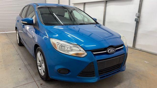 2014 Blue Ford Focus SE (1FADP3F20EL) with an 2L I-4 gasoline dire engine, located at 1806 Veterans Memorial Hwy SW, Austell, GA, 30168, (770) 944-9558, 33.817959, -84.606987- Photo#8