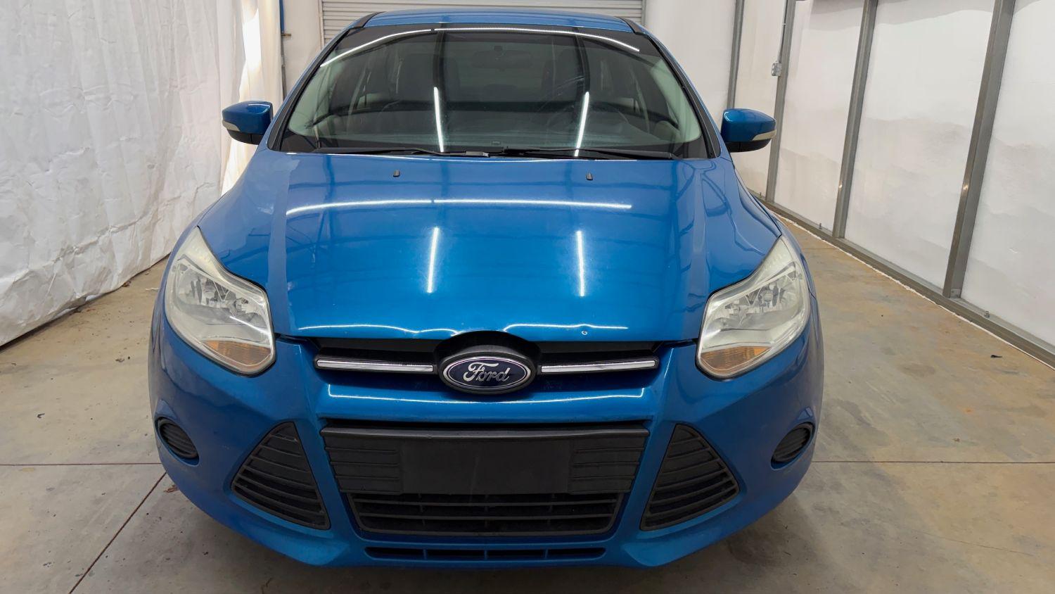 2014 Blue Ford Focus SE (1FADP3F20EL) with an 2L I-4 gasoline dire engine, located at 1806 Veterans Memorial Hwy SW, Austell, GA, 30168, (770) 944-9558, 33.817959, -84.606987- Photo#9