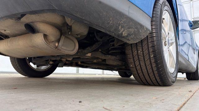 2014 Blue Ford Focus SE (1FADP3F20EL) with an 2L I-4 gasoline dire engine, located at 1806 Veterans Memorial Hwy SW, Austell, GA, 30168, (770) 944-9558, 33.817959, -84.606987- Photo#16