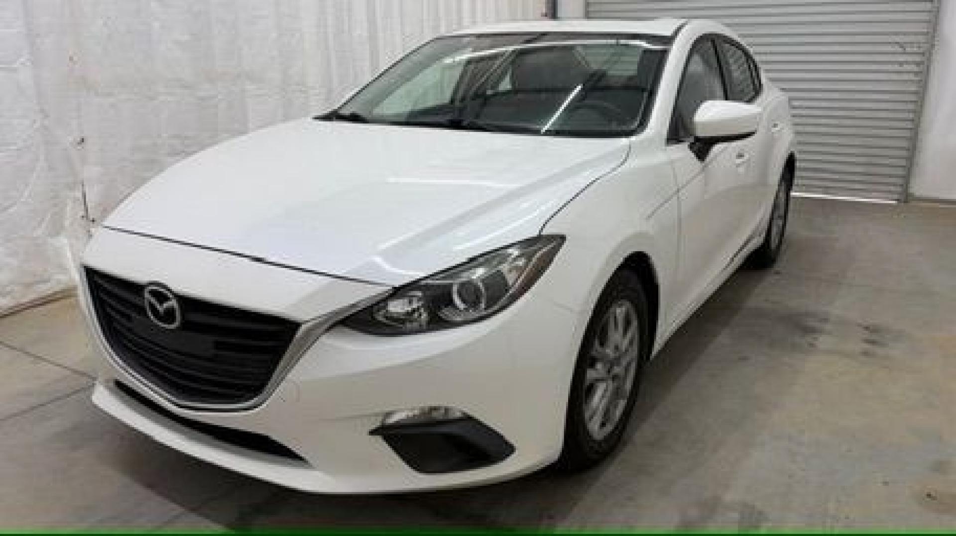 2014 White Mazda Mazda3 i Grand Touring (JM1BM1W75E1) with an SKYACTIV-G 2L I-4 gasoline direct injection engine, located at 1806 Veterans Memorial Hwy SW, Austell, GA, 30168, (770) 944-9558, 33.817959, -84.606987- Photo#0