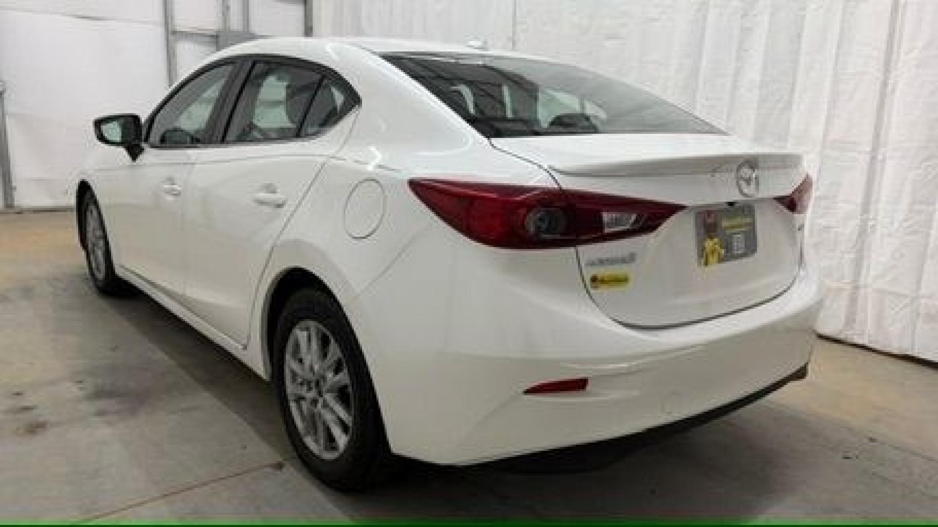 2014 White Mazda Mazda3 i Grand Touring (JM1BM1W75E1) with an SKYACTIV-G 2L I-4 gasoline direct injection engine, located at 1806 Veterans Memorial Hwy SW, Austell, GA, 30168, (770) 944-9558, 33.817959, -84.606987- Photo#3
