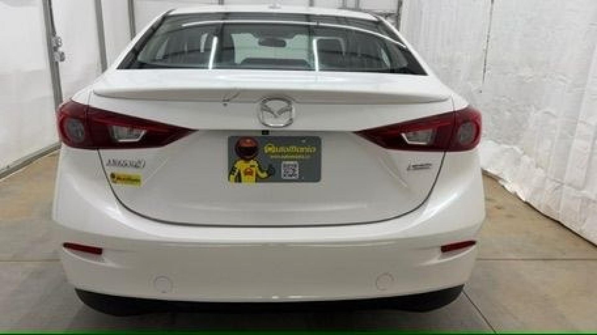 2014 White Mazda Mazda3 i Grand Touring (JM1BM1W75E1) with an SKYACTIV-G 2L I-4 gasoline direct injection engine, located at 1806 Veterans Memorial Hwy SW, Austell, GA, 30168, (770) 944-9558, 33.817959, -84.606987- Photo#4