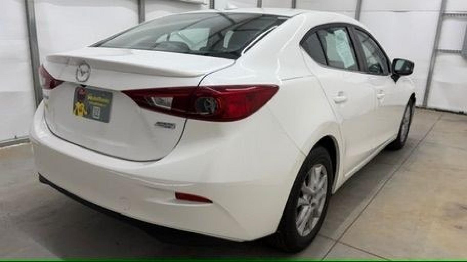 2014 White Mazda Mazda3 i Grand Touring (JM1BM1W75E1) with an SKYACTIV-G 2L I-4 gasoline direct injection engine, located at 1806 Veterans Memorial Hwy SW, Austell, GA, 30168, (770) 944-9558, 33.817959, -84.606987- Photo#5