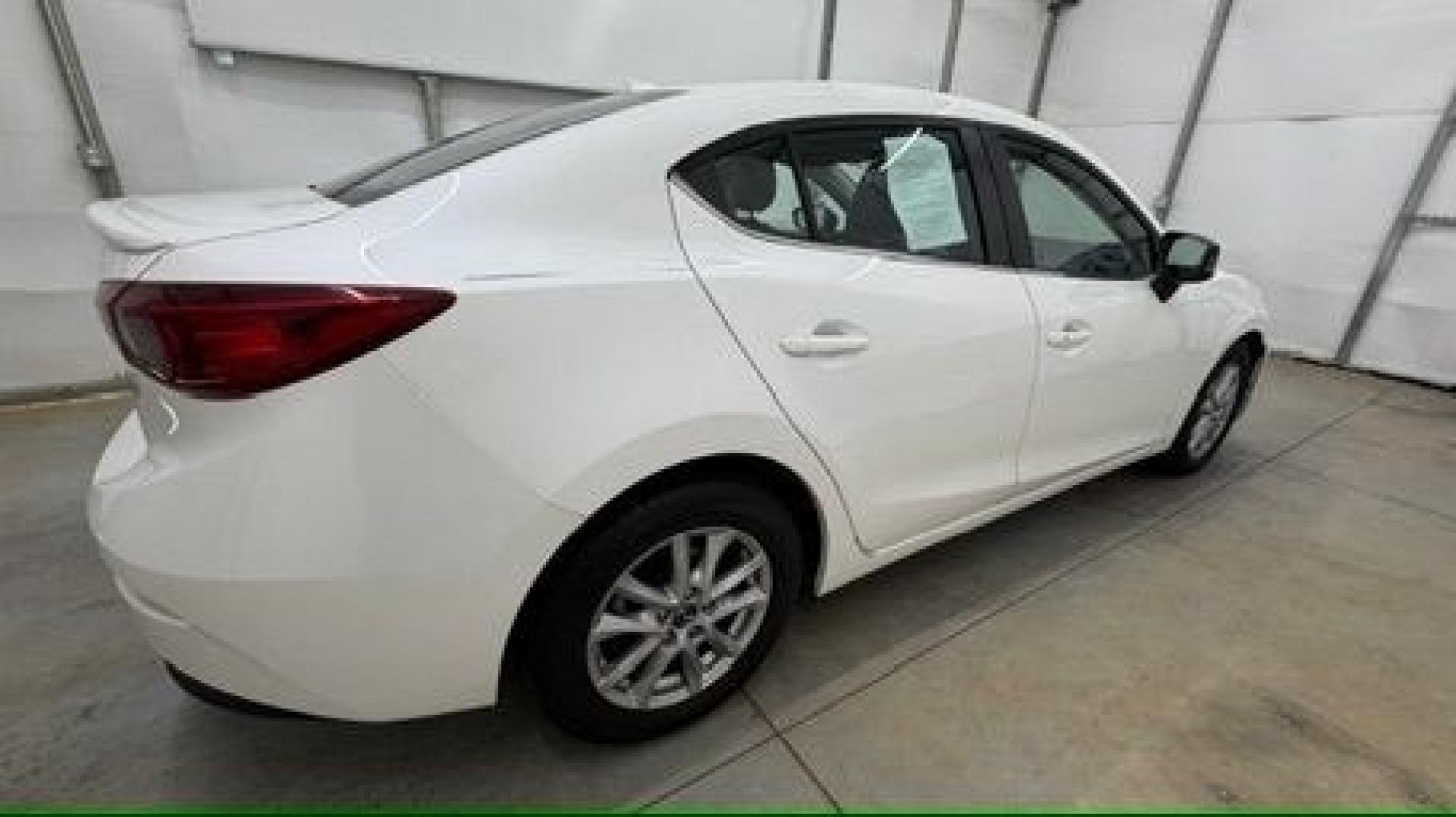2014 White Mazda Mazda3 i Grand Touring (JM1BM1W75E1) with an SKYACTIV-G 2L I-4 gasoline direct injection engine, located at 1806 Veterans Memorial Hwy SW, Austell, GA, 30168, (770) 944-9558, 33.817959, -84.606987- Photo#6