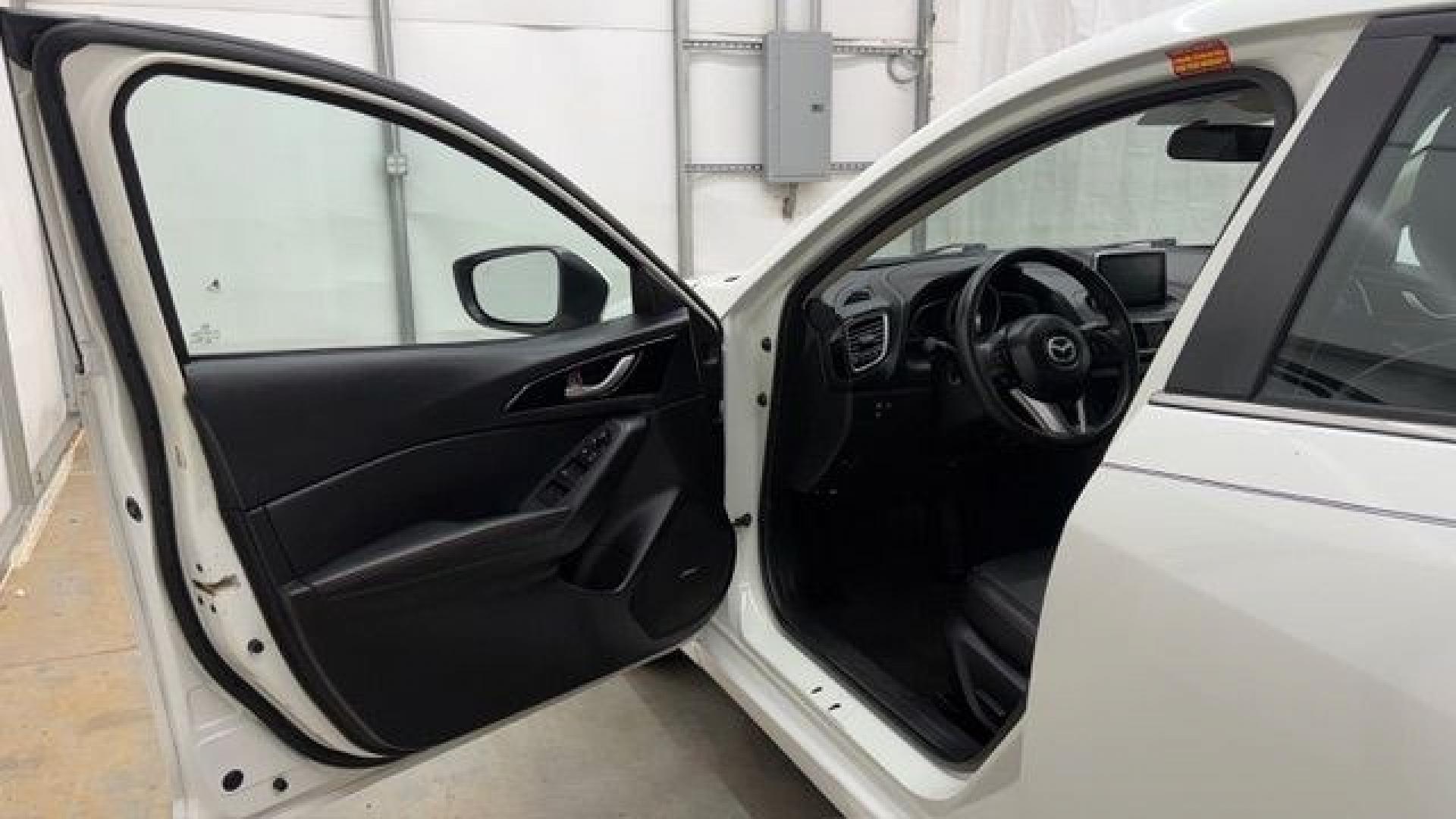 2014 White Mazda Mazda3 i Grand Touring (JM1BM1W75E1) with an SKYACTIV-G 2L I-4 gasoline direct injection engine, located at 1806 Veterans Memorial Hwy SW, Austell, GA, 30168, (770) 944-9558, 33.817959, -84.606987- Photo#10