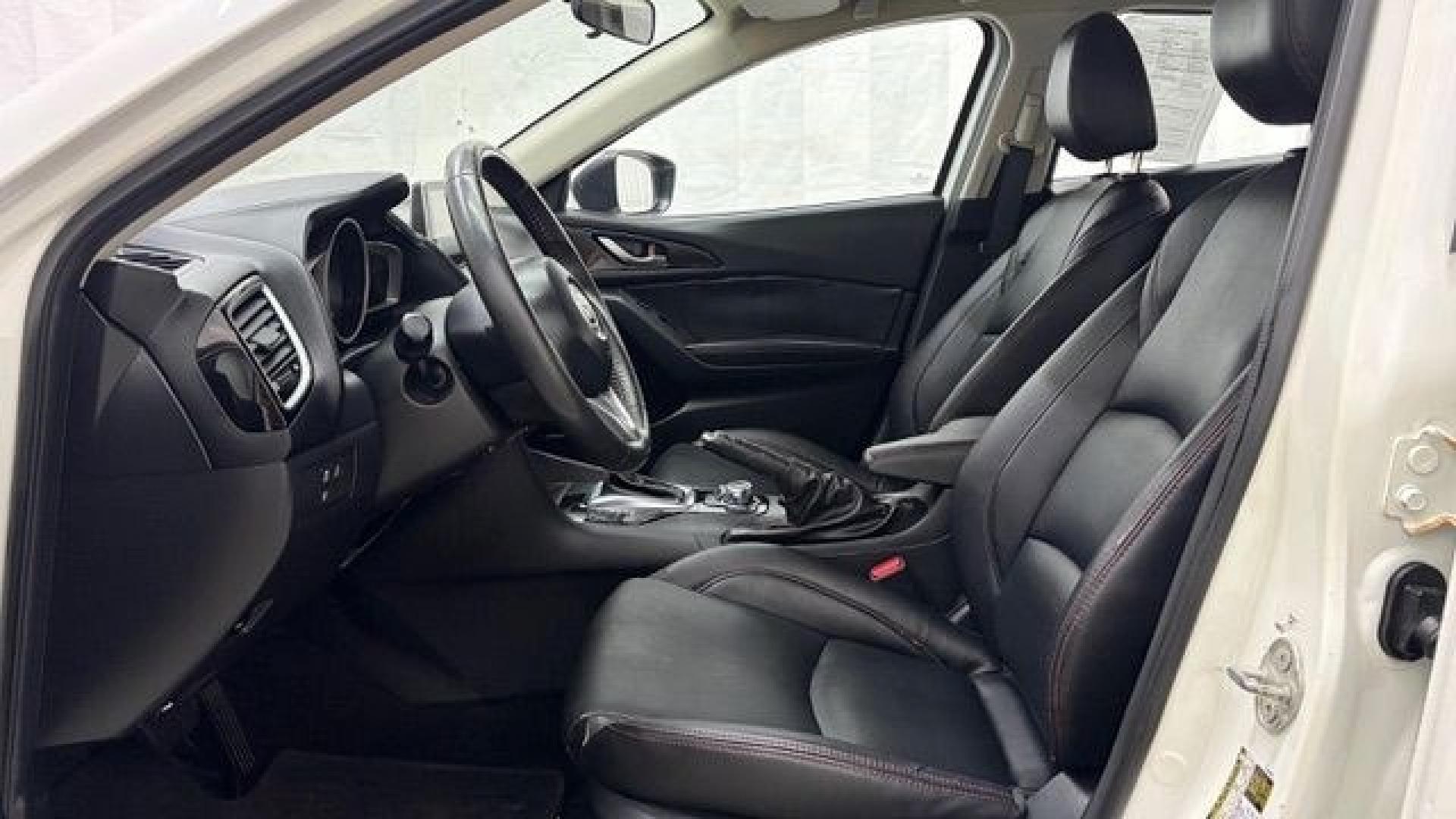 2014 White Mazda Mazda3 i Grand Touring (JM1BM1W75E1) with an SKYACTIV-G 2L I-4 gasoline direct injection engine, located at 1806 Veterans Memorial Hwy SW, Austell, GA, 30168, (770) 944-9558, 33.817959, -84.606987- Photo#11