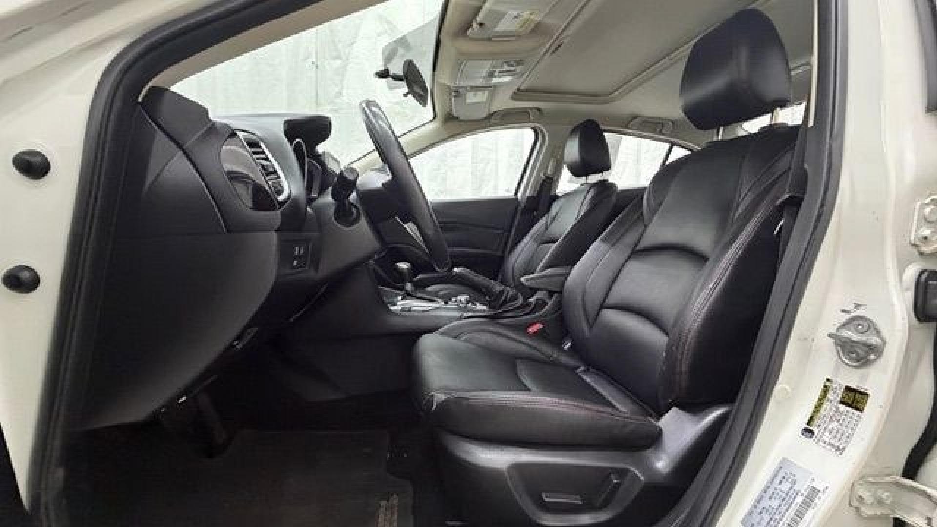 2014 White Mazda Mazda3 i Grand Touring (JM1BM1W75E1) with an SKYACTIV-G 2L I-4 gasoline direct injection engine, located at 1806 Veterans Memorial Hwy SW, Austell, GA, 30168, (770) 944-9558, 33.817959, -84.606987- Photo#12