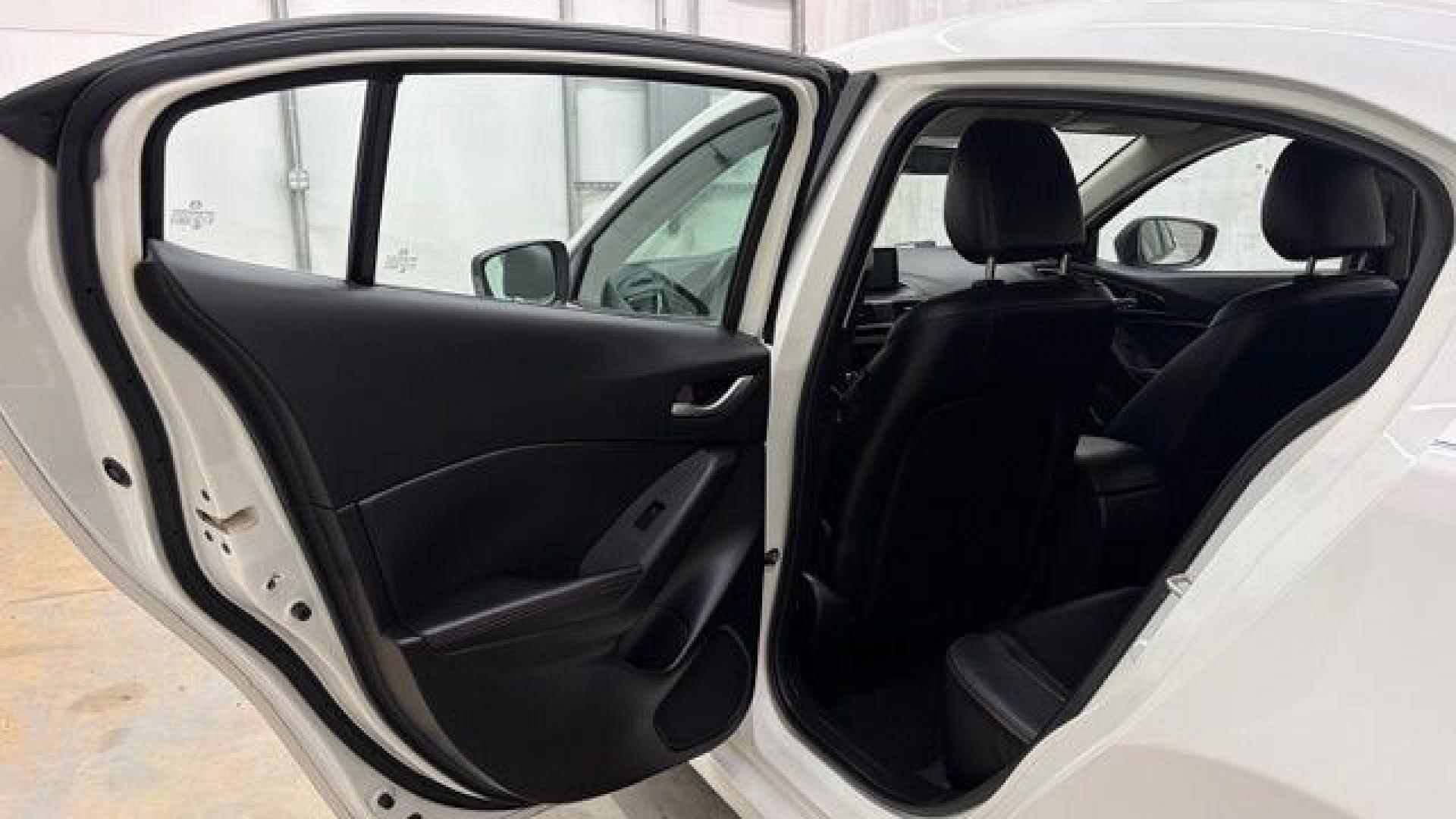 2014 White Mazda Mazda3 i Grand Touring (JM1BM1W75E1) with an SKYACTIV-G 2L I-4 gasoline direct injection engine, located at 1806 Veterans Memorial Hwy SW, Austell, GA, 30168, (770) 944-9558, 33.817959, -84.606987- Photo#13