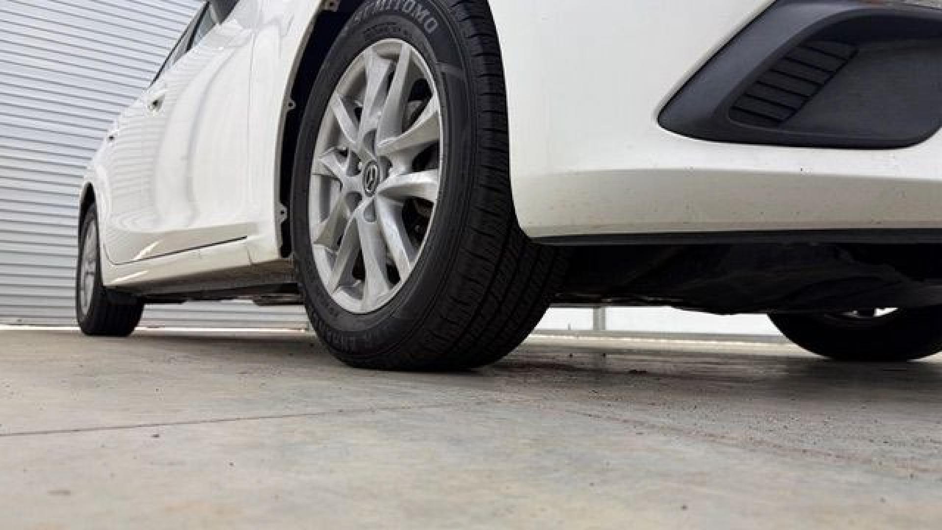 2014 White Mazda Mazda3 i Grand Touring (JM1BM1W75E1) with an SKYACTIV-G 2L I-4 gasoline direct injection engine, located at 1806 Veterans Memorial Hwy SW, Austell, GA, 30168, (770) 944-9558, 33.817959, -84.606987- Photo#18
