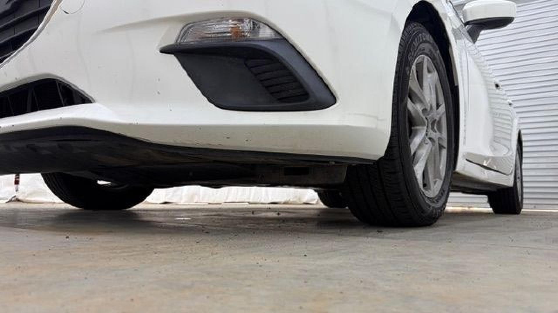 2014 White Mazda Mazda3 i Grand Touring (JM1BM1W75E1) with an SKYACTIV-G 2L I-4 gasoline direct injection engine, located at 1806 Veterans Memorial Hwy SW, Austell, GA, 30168, (770) 944-9558, 33.817959, -84.606987- Photo#19